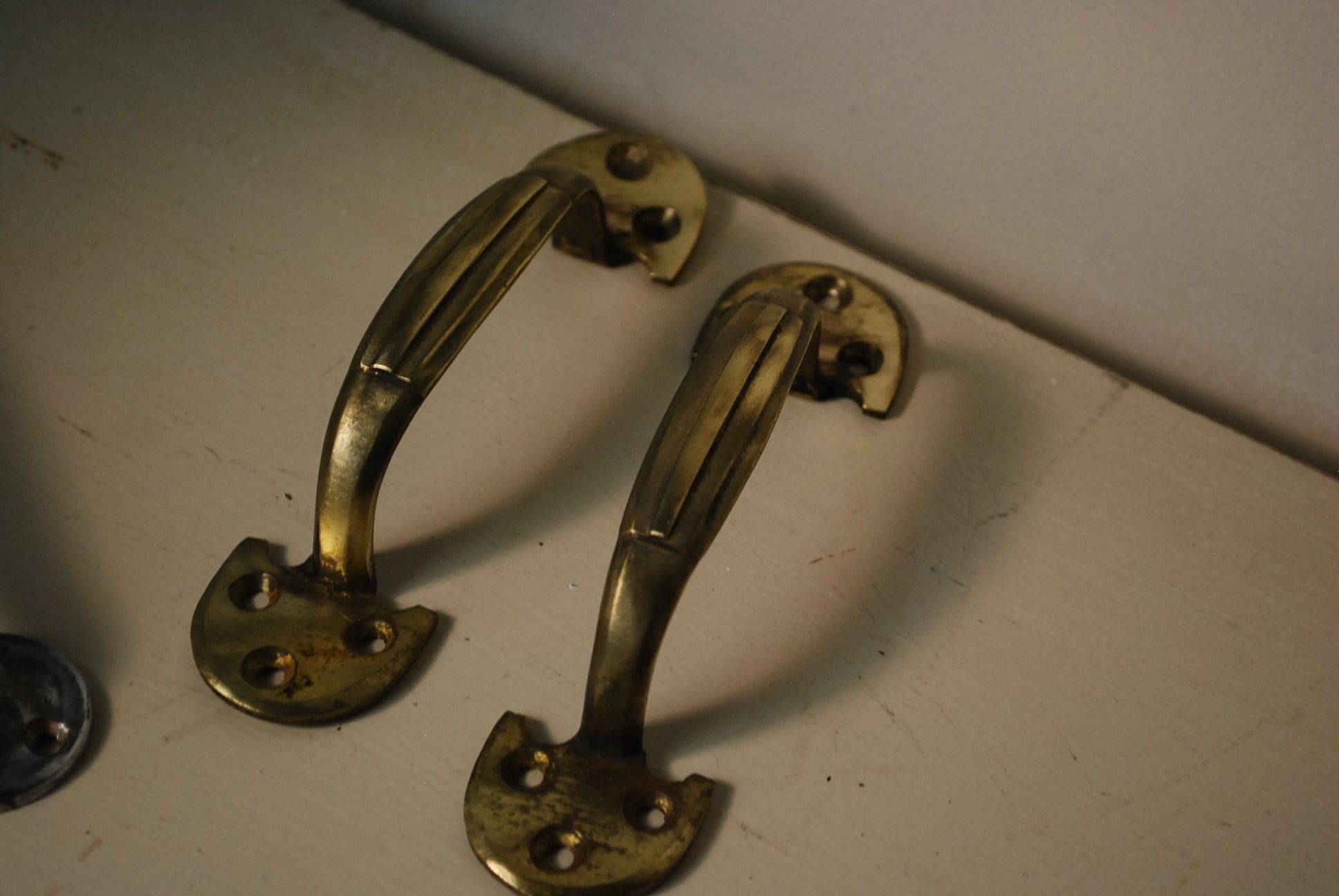 1910 brass French door Cabinet Handles | Scott Landon Antiques and Interiors.