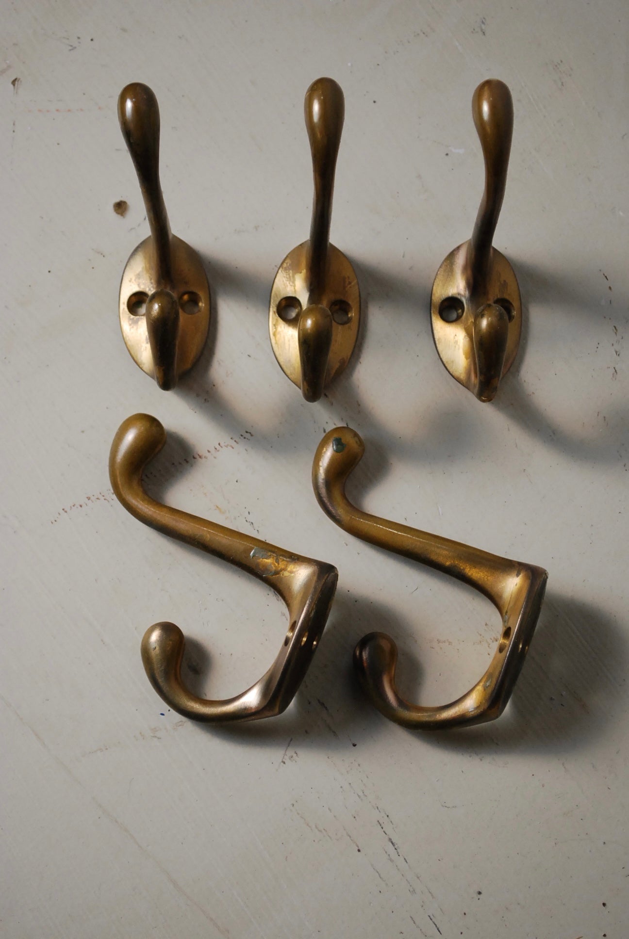1930 Heavy Gauge Brass hooks | Scott Landon Antiques and Interiors.