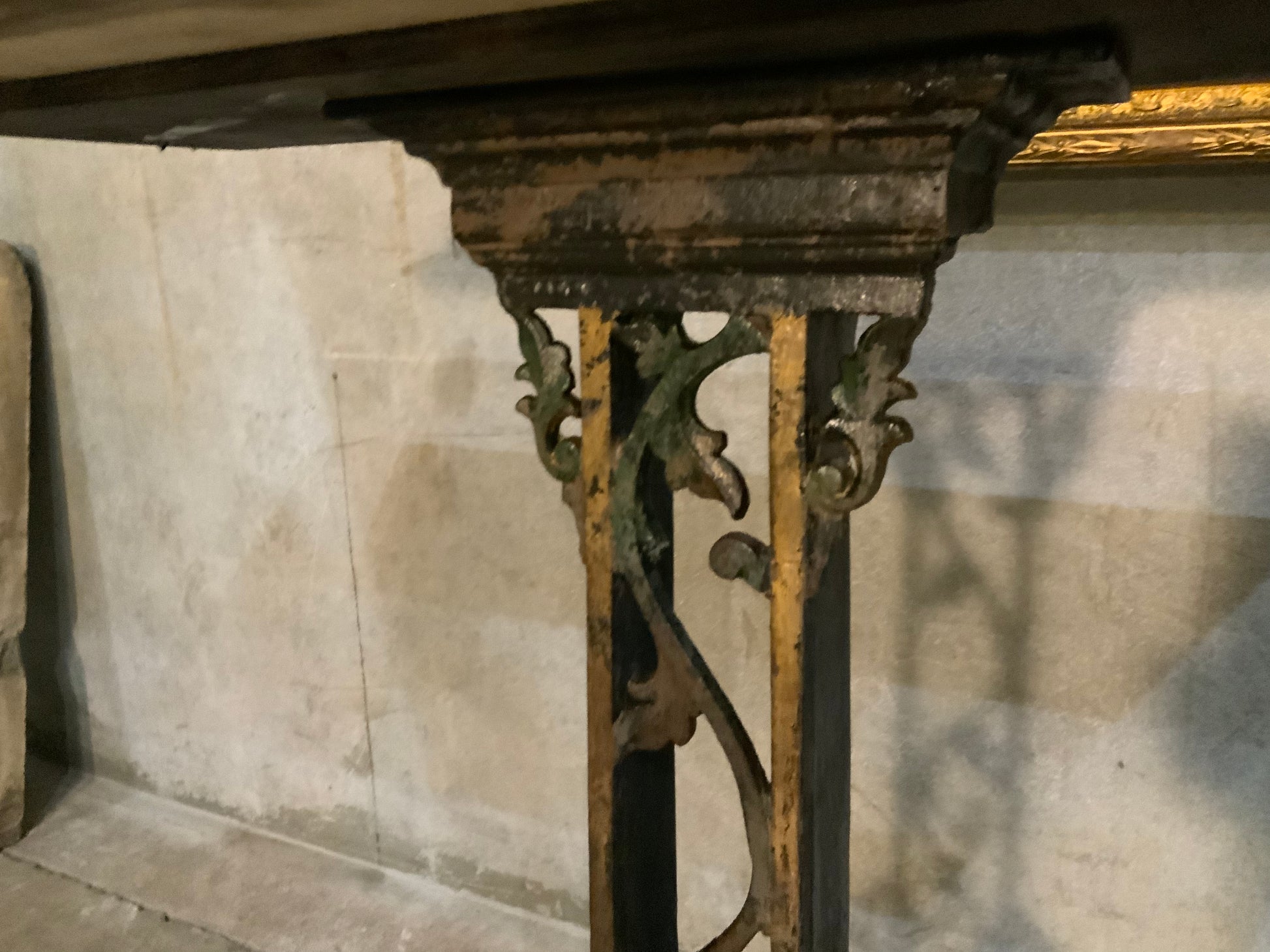 C 1900 cast iron detailed table base with marble top | Scott Landon Antiques and Interiors.