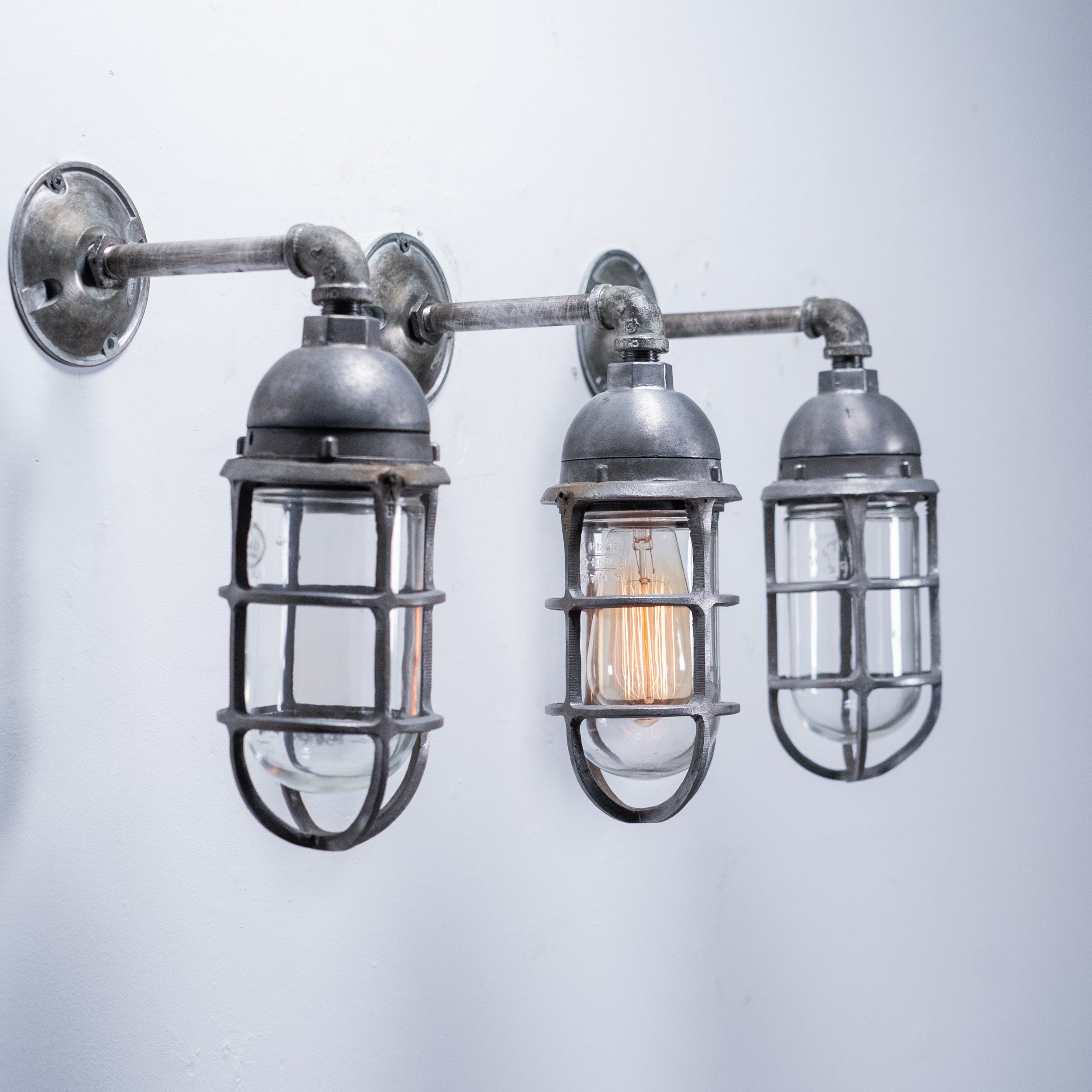 1950 Caged Industrial Sconces with Globes