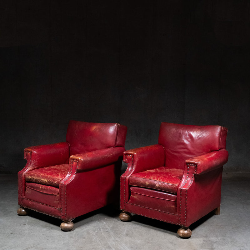 Original aged red leather and hand-applied nailhead trim on antique English club chair | Scott Landon Antiques and Interiors.