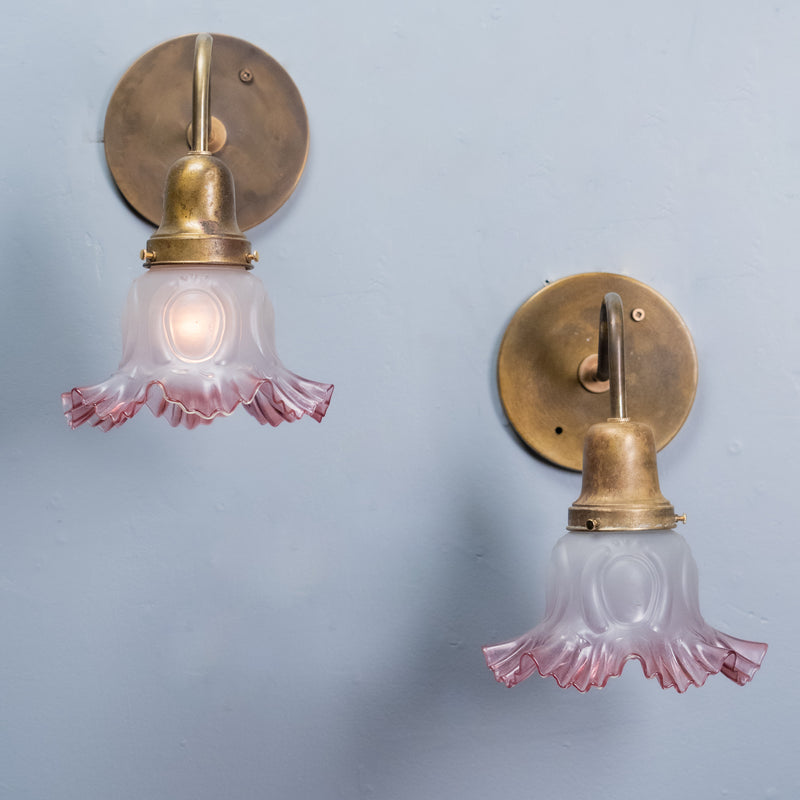 Pair antique brass gooseneck wall sconces with pink frosted glass shades circa 1910 | Scott Landon Antiques and Interiors.