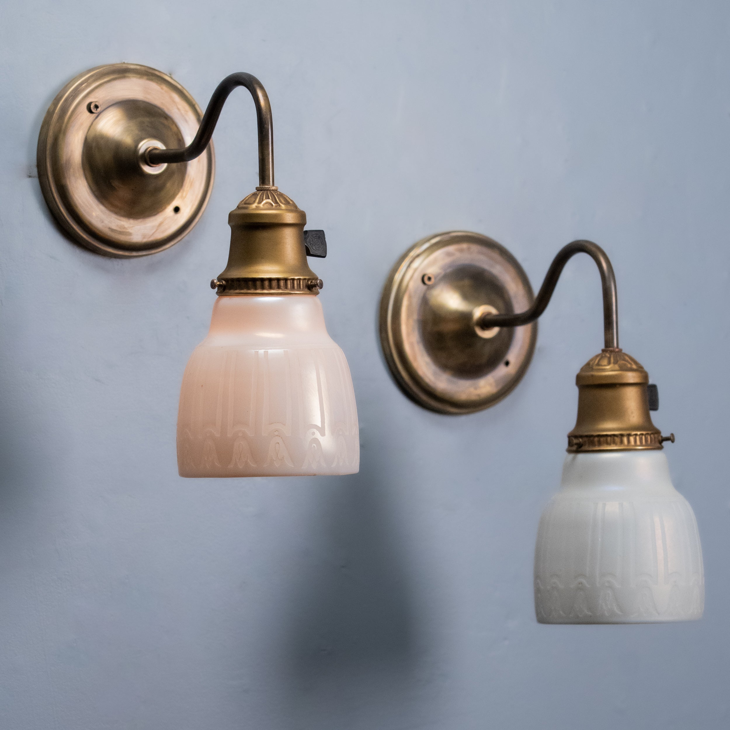 Pair of antique brass gooseneck wall sconces with etched opal glass shades circa 1910 | Scott Landon Antiques and Interiors.