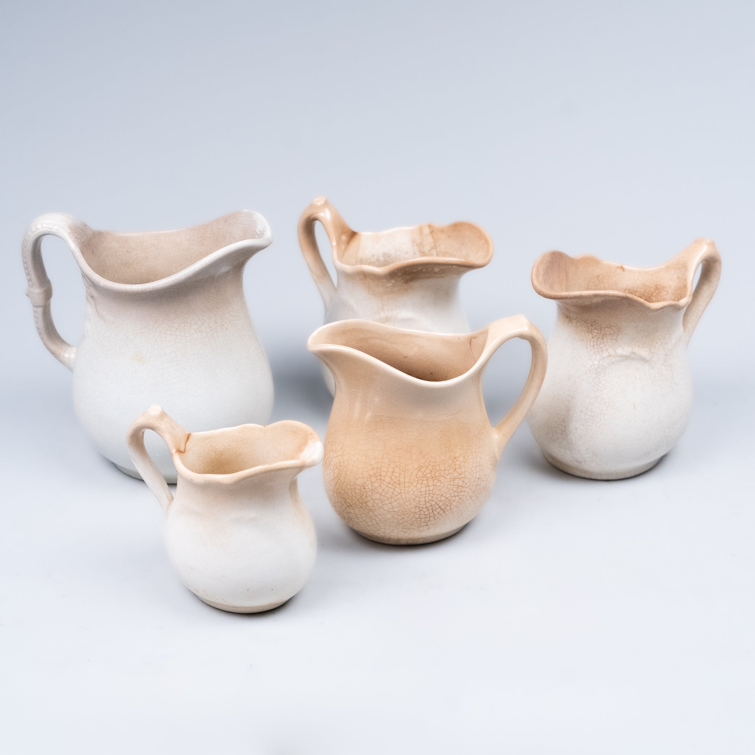 19th century ironstone cream pitchers
