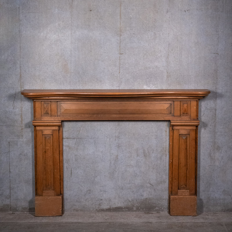 19th century Quebec pine fireplace mantel circa 1880 with carved geometric details and moulded shelf | Scott Landon Antiques and Interiors.