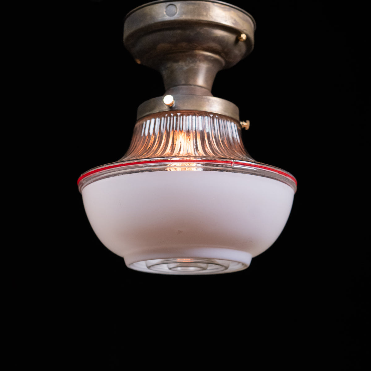 Antique 1930s Art Deco semi-flush ceiling light with molded frosted glass shade, clear ribbed glass and red accent detail | Scott Landon Antiques and Interiors.