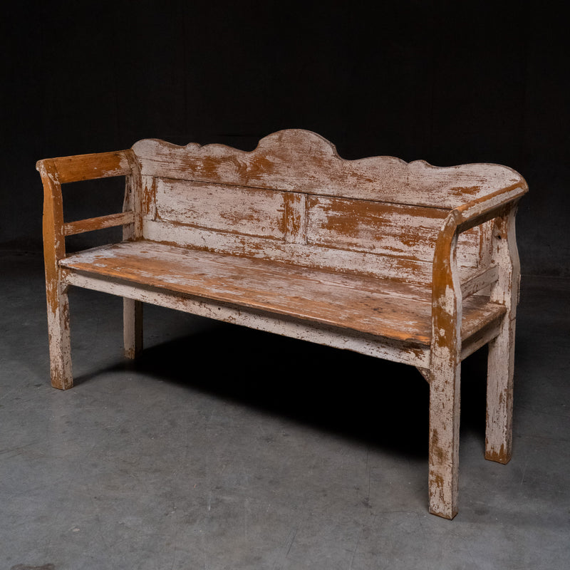  Antique Canadian painted pine settle bench circa 1900–1920, attributed to Saskatchewan, with shaped crest and original worn painted surface. | Scott Landon Antiques and Interiors.