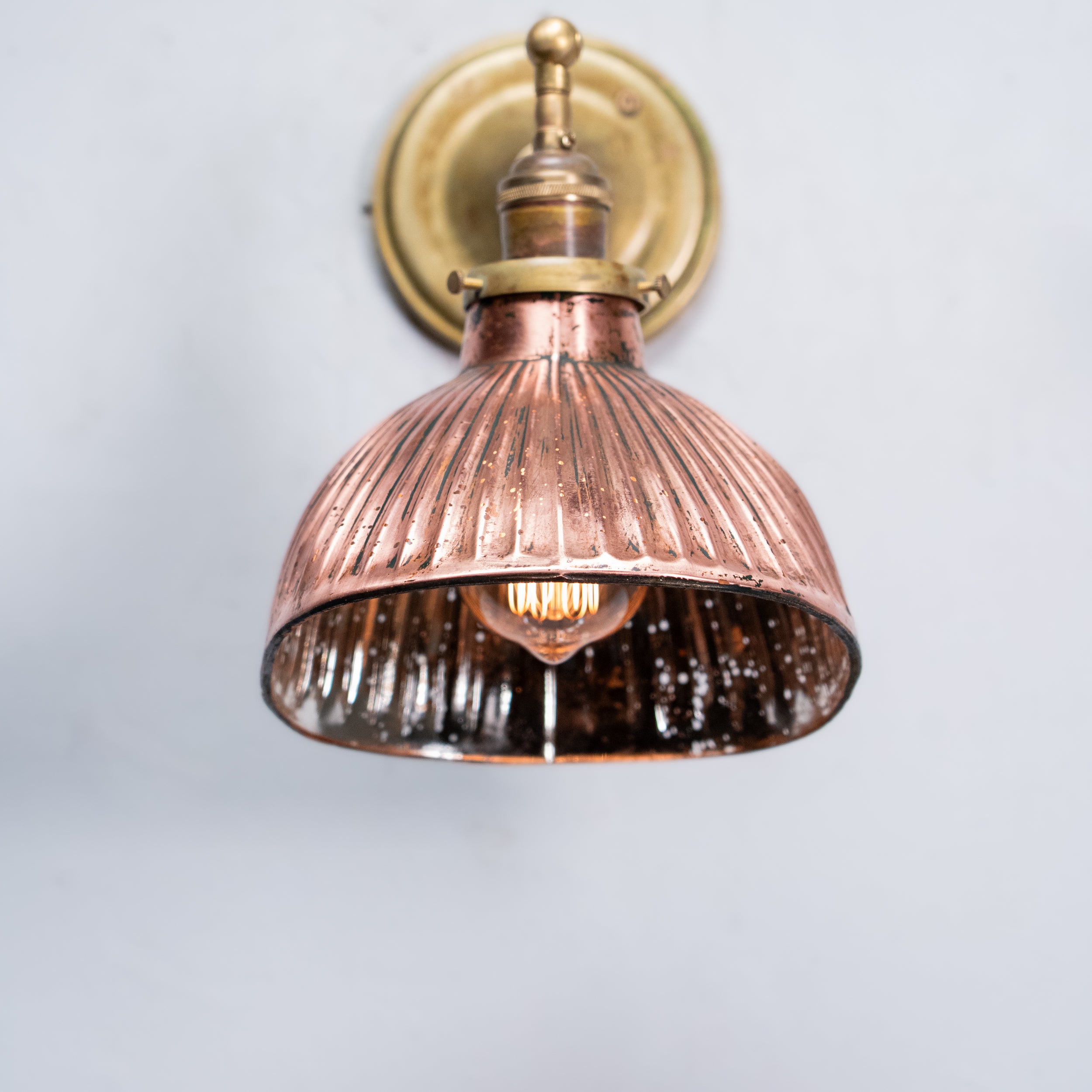 single copper mercury shade sconce | Scott Landon Antiques and Interiors.