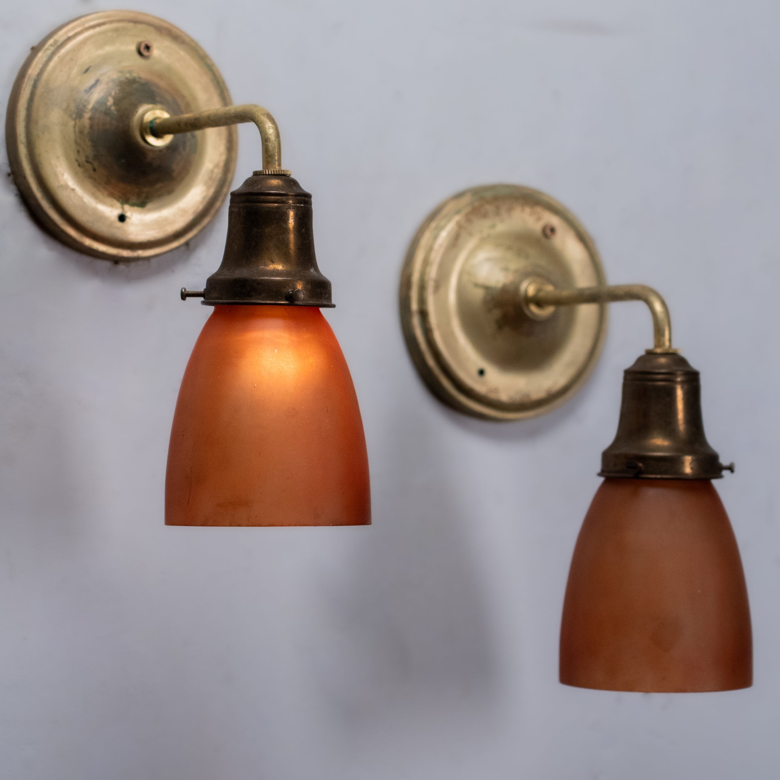 amber shade brass sconces | Scott Landon Antiques and Interiors.