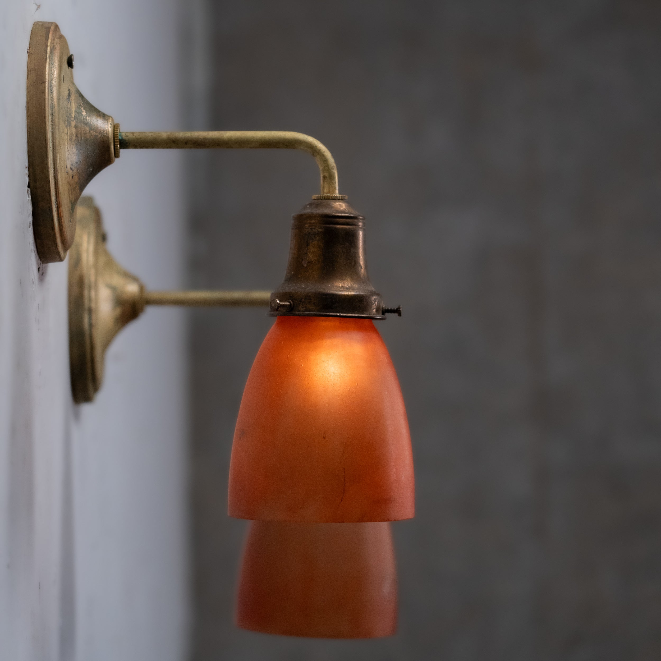 amber shade brass sconces | Scott Landon Antiques and Interiors.