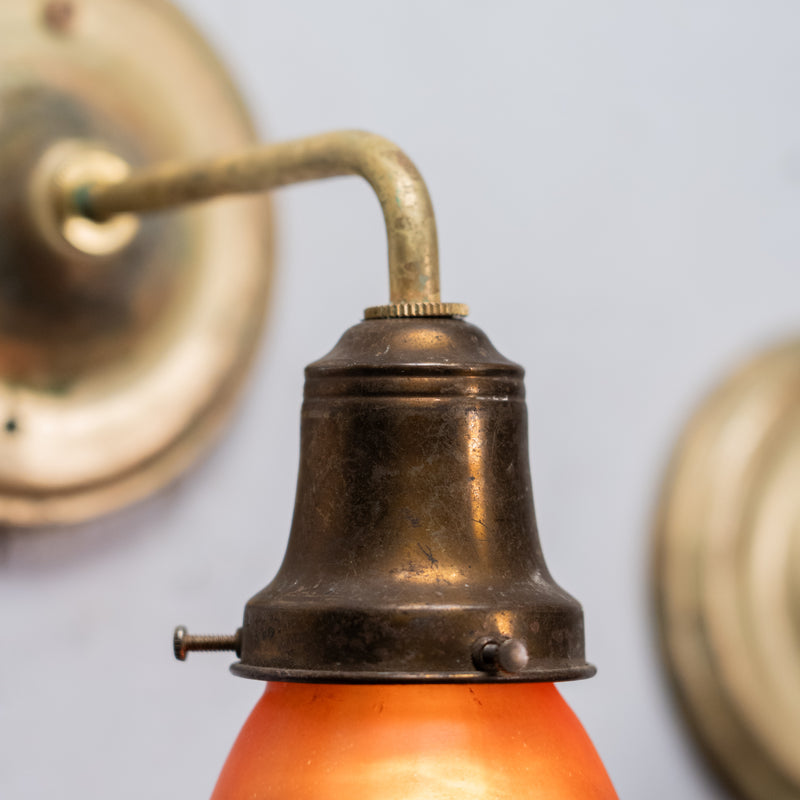 amber shade brass sconces | Scott Landon Antiques and Interiors.