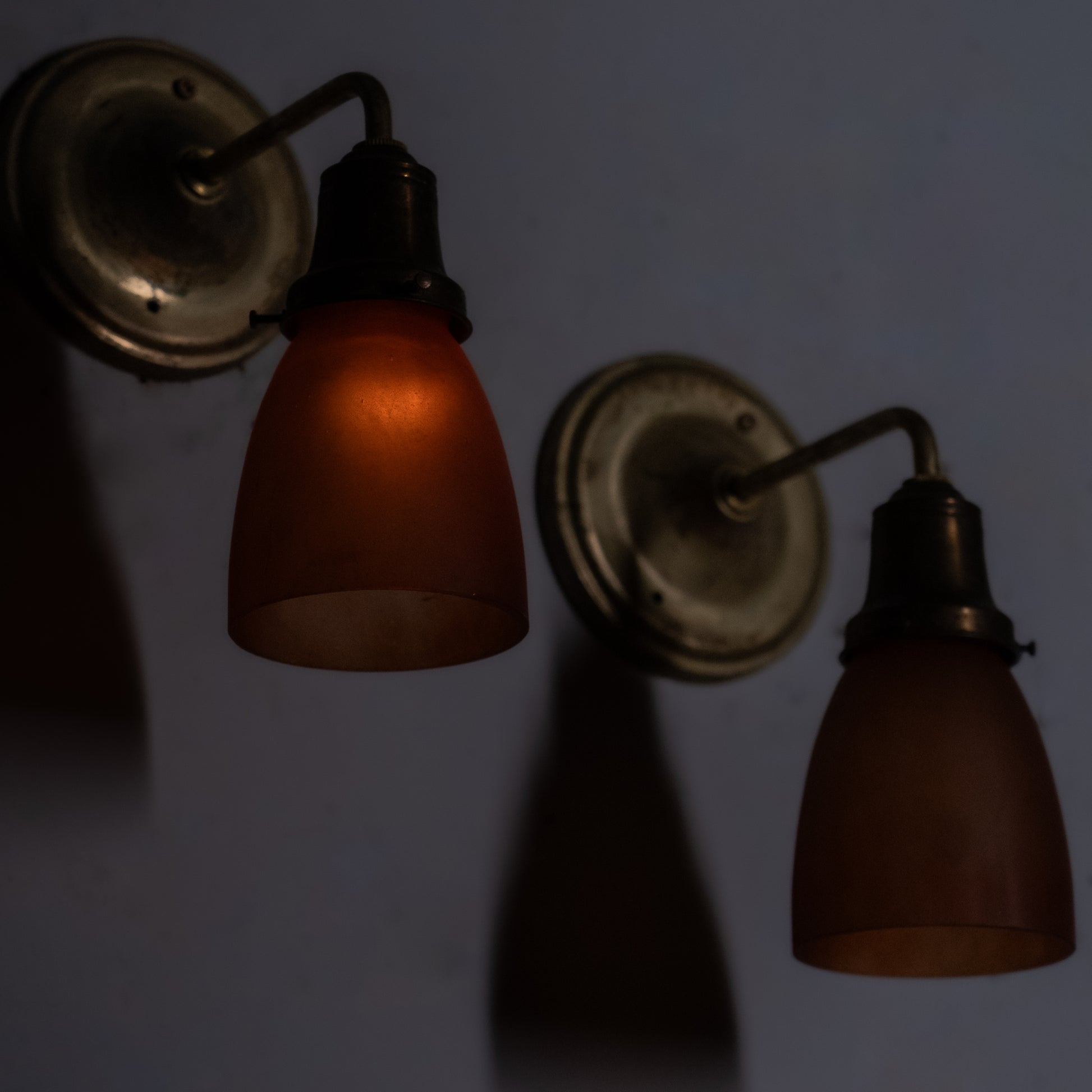 amber shade brass sconces | Scott Landon Antiques and Interiors.