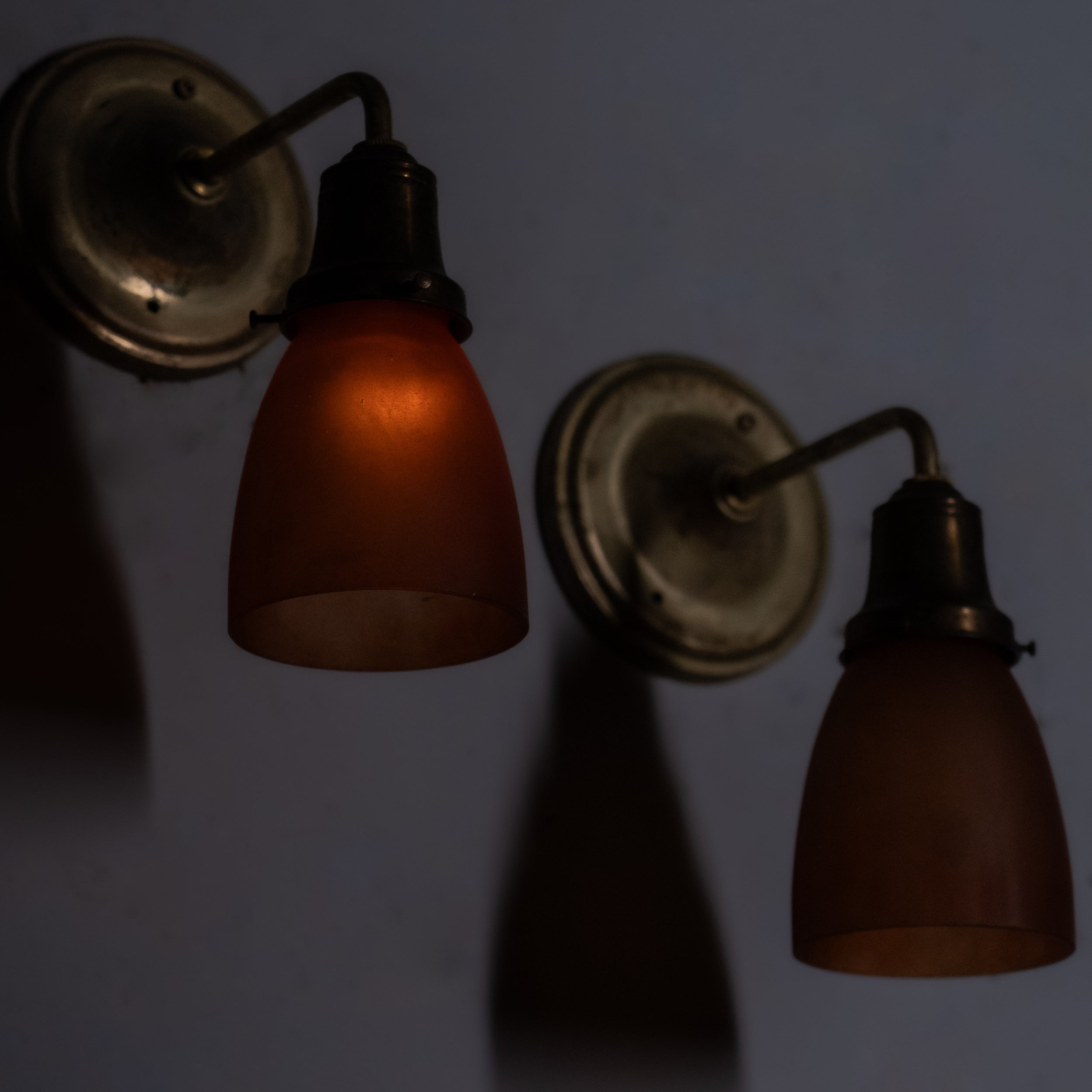 amber shade brass sconces | Scott Landon Antiques and Interiors.