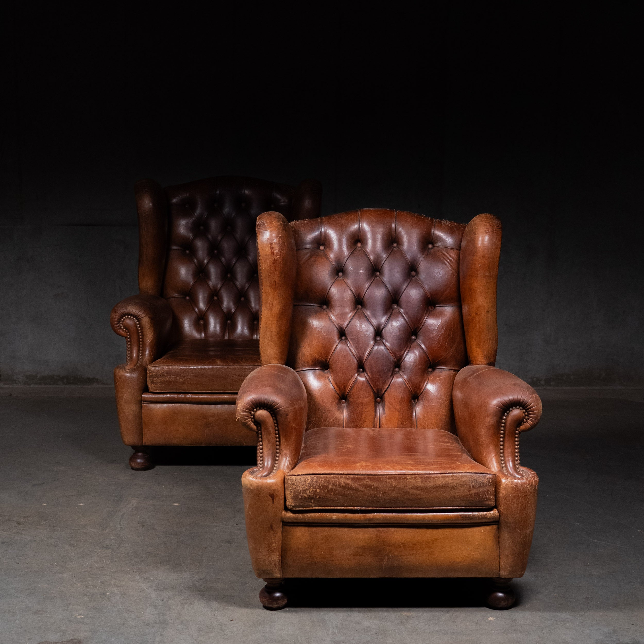 1930 Pair of English Tufted Wingback Chairs