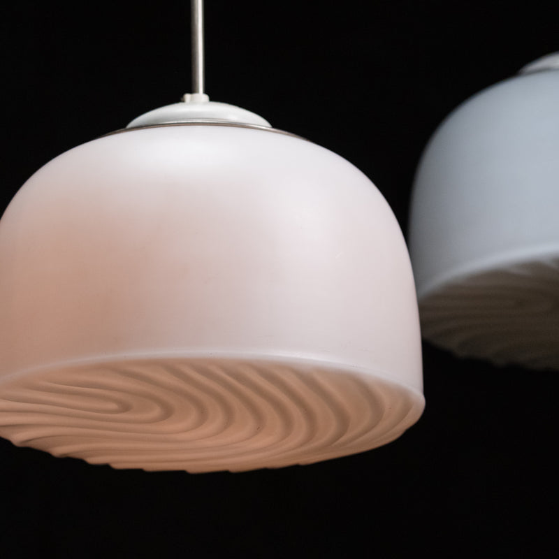 Antique white opaline glass pendant light with sculpted swirl pattern underside and original metal fittings, circa 1930s.