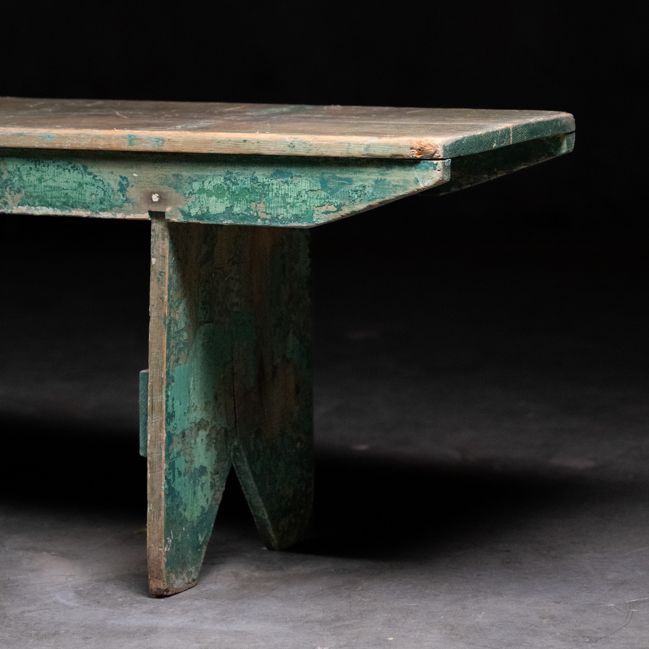 Antique 8 foot painted pine bench with original green paint and primitive trestle base, circa 1900 | Scott Landon Antiques and Interiors.