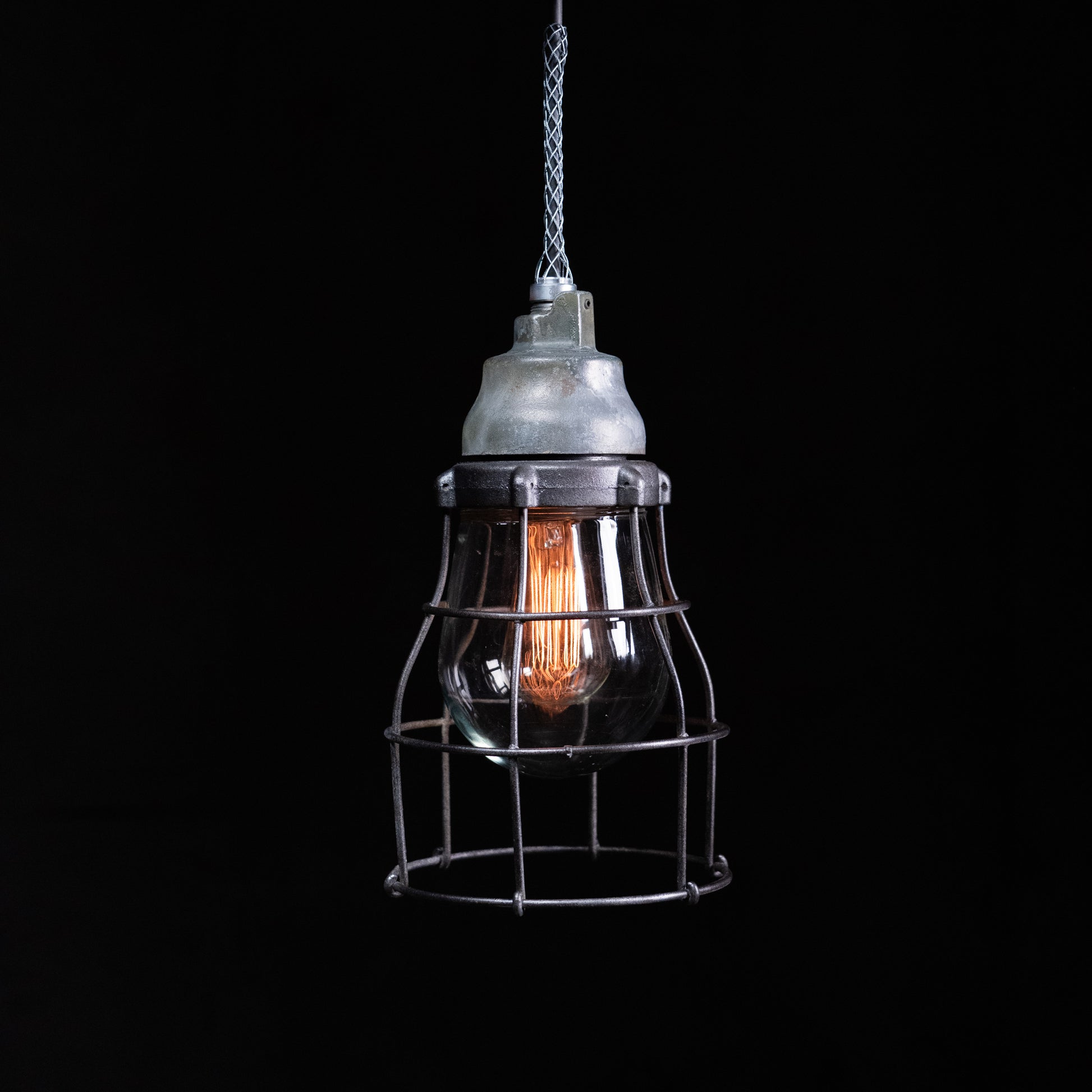  * Vintage Crouse-Hinds industrial cage pendant light | Scott Landon Antiques and Interiors.