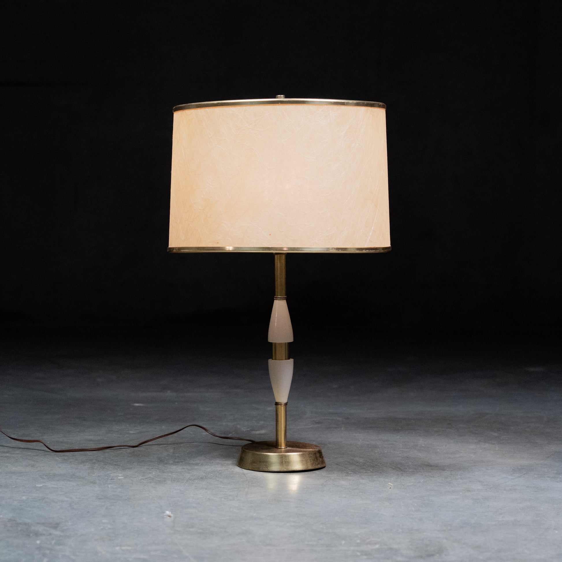 Mid-Century Modern brass table lamp with white cased glass accents