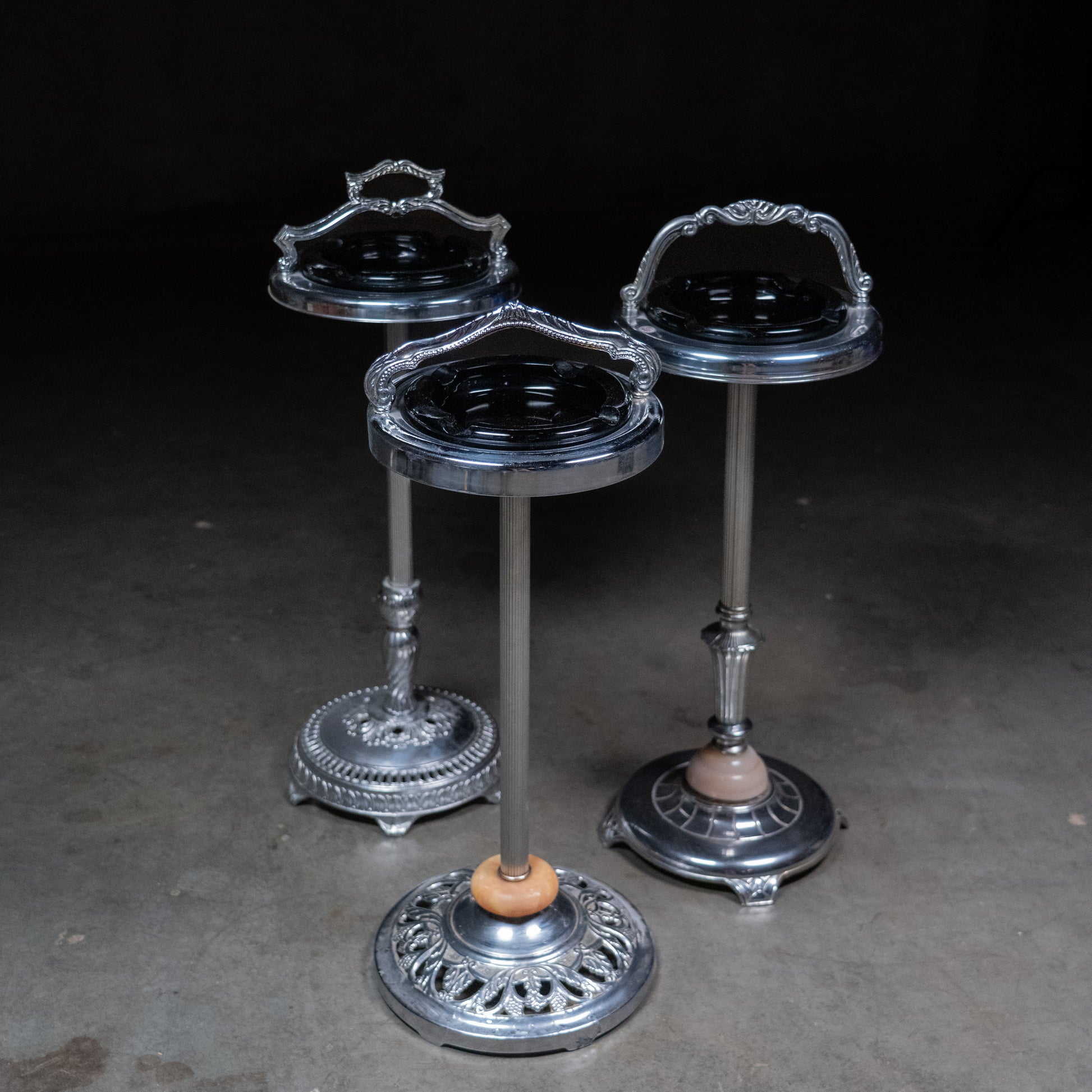  Art Deco floor standing ashtray with black glass insert and cast metal base c.1930 | Scott Landon Antiques and Interiors.