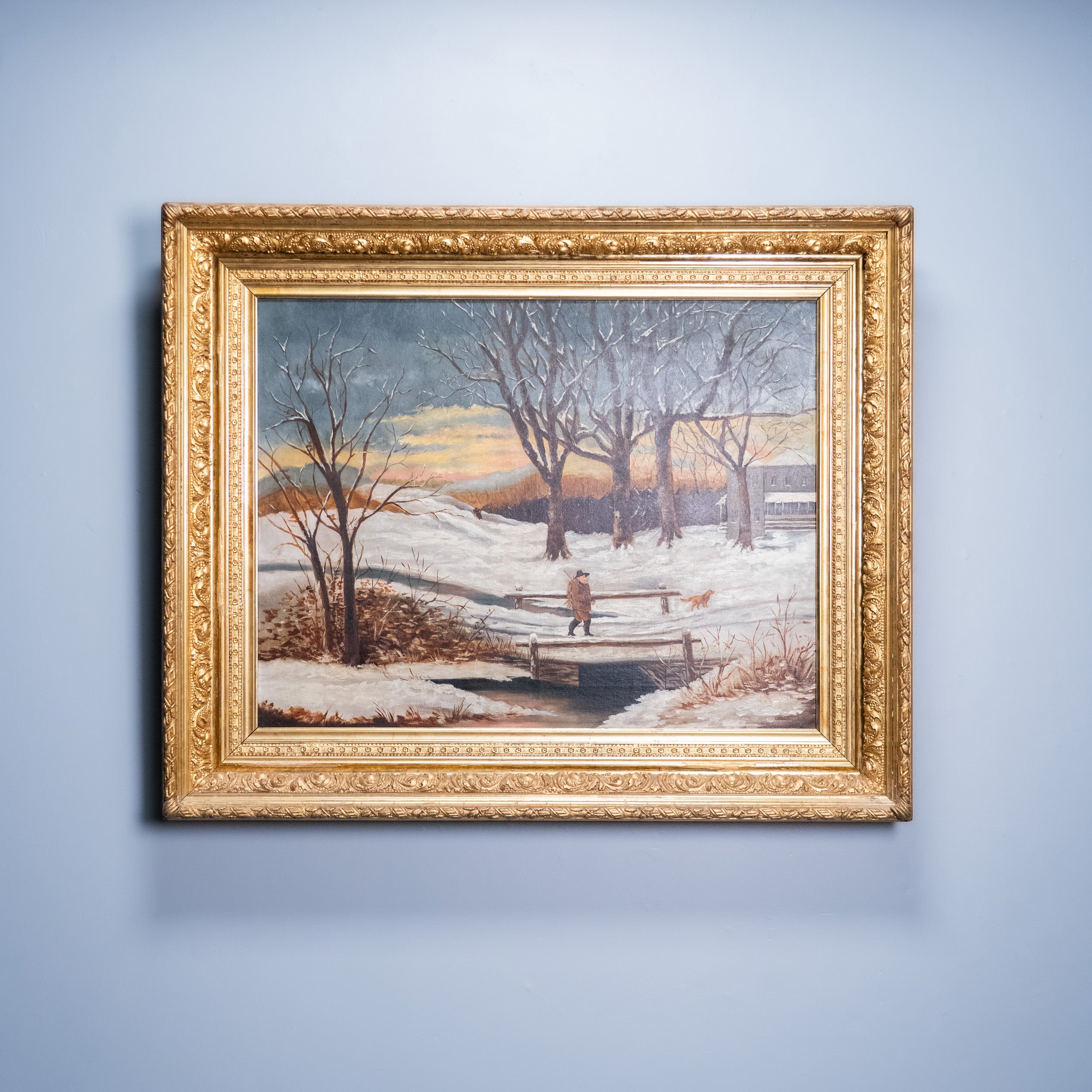 American winter landscape oil painting with figure carrying firewood through snow | Scott Landon Antiques and Interiors.