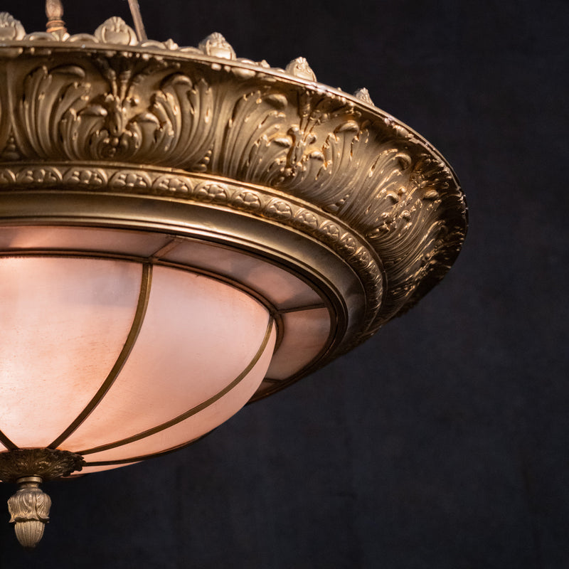 Close-up of ornate acanthus gilt casting on monumental Beaux Arts architectural chandelier | Scott Landon Antiques and Interiors.