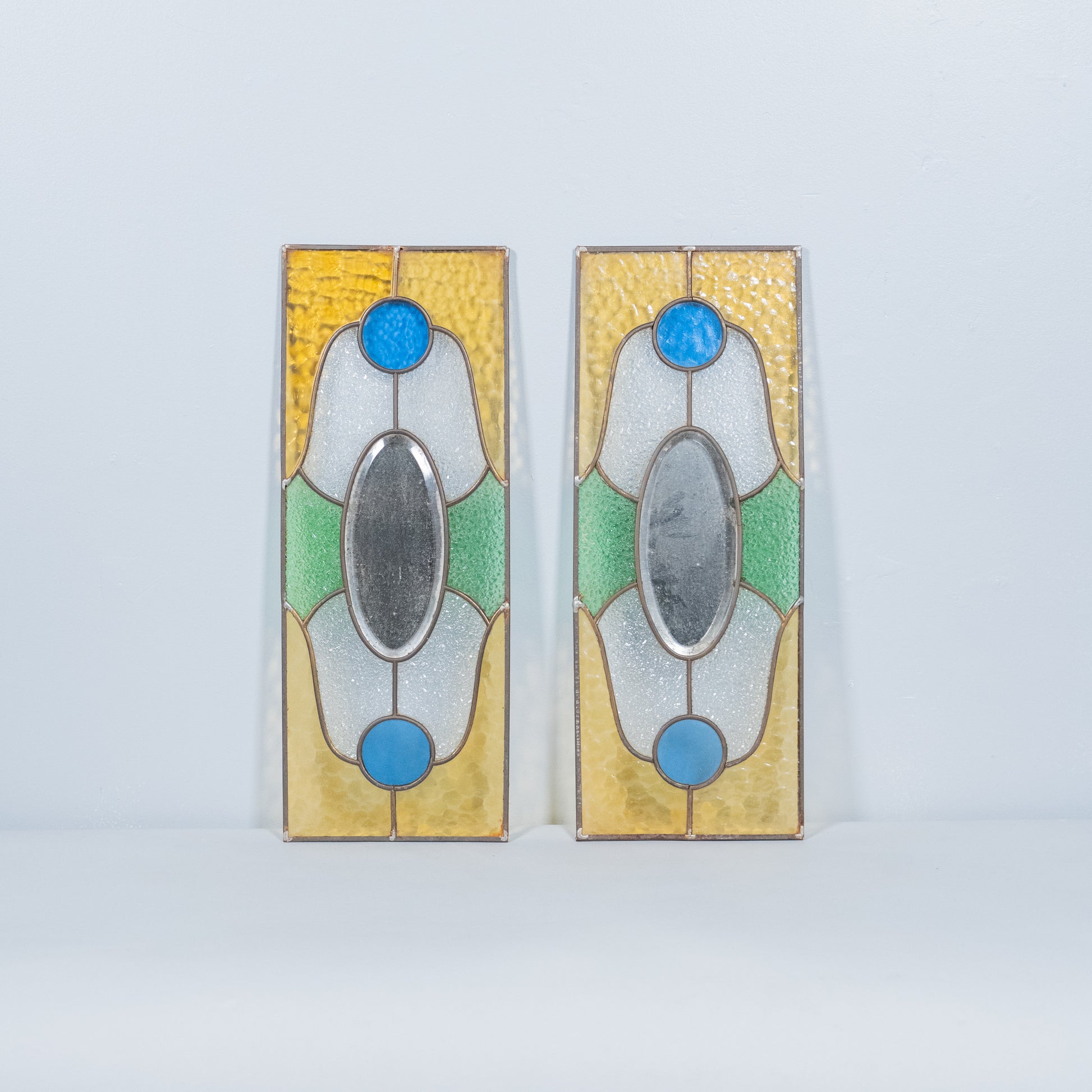 pair of stain glass windows | Scott Landon Antiques and Interiors.