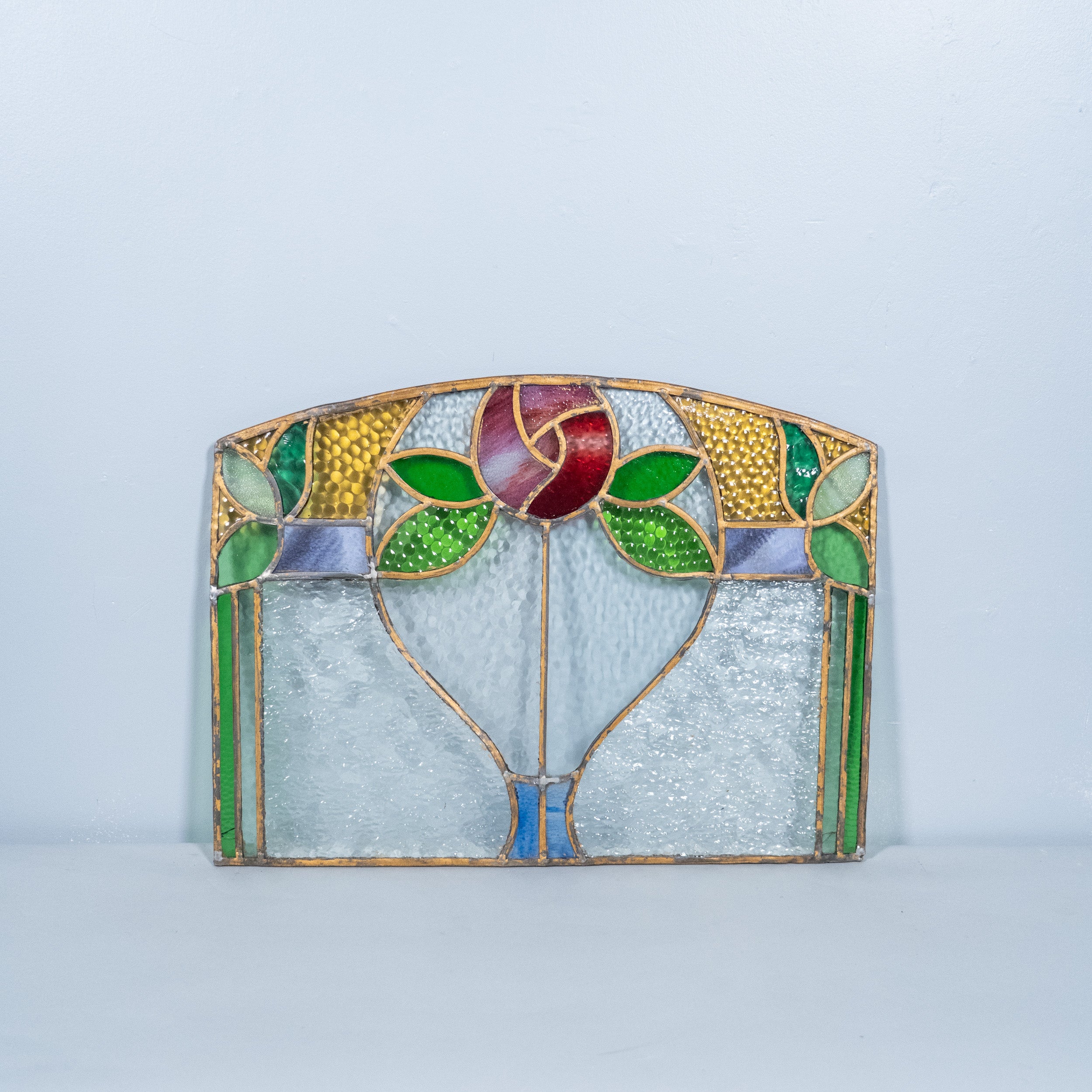 pair of brass stain glass windows | Scott Landon Antiques and Interiors.