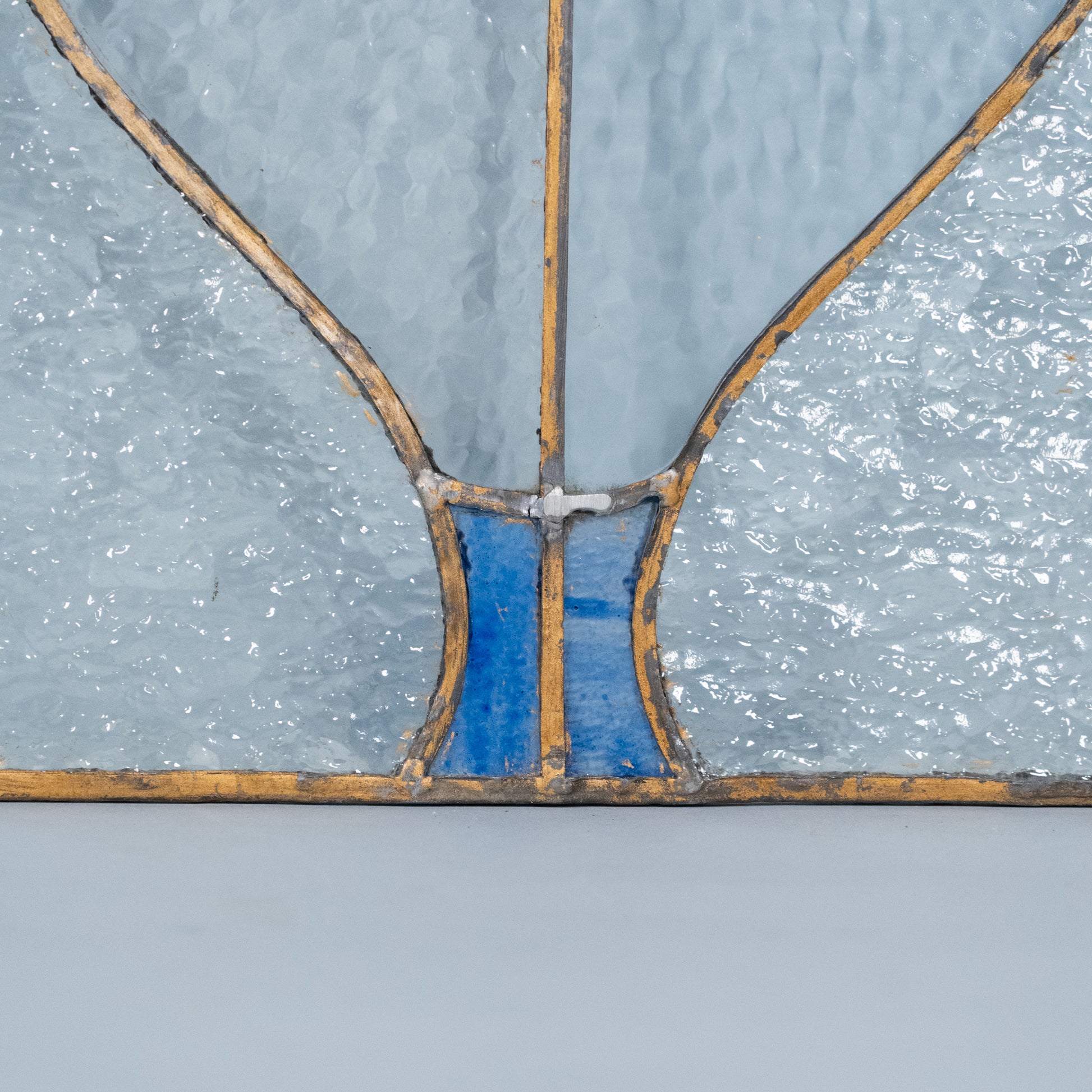 pair of brass stain glass windows | Scott Landon Antiques and Interiors.