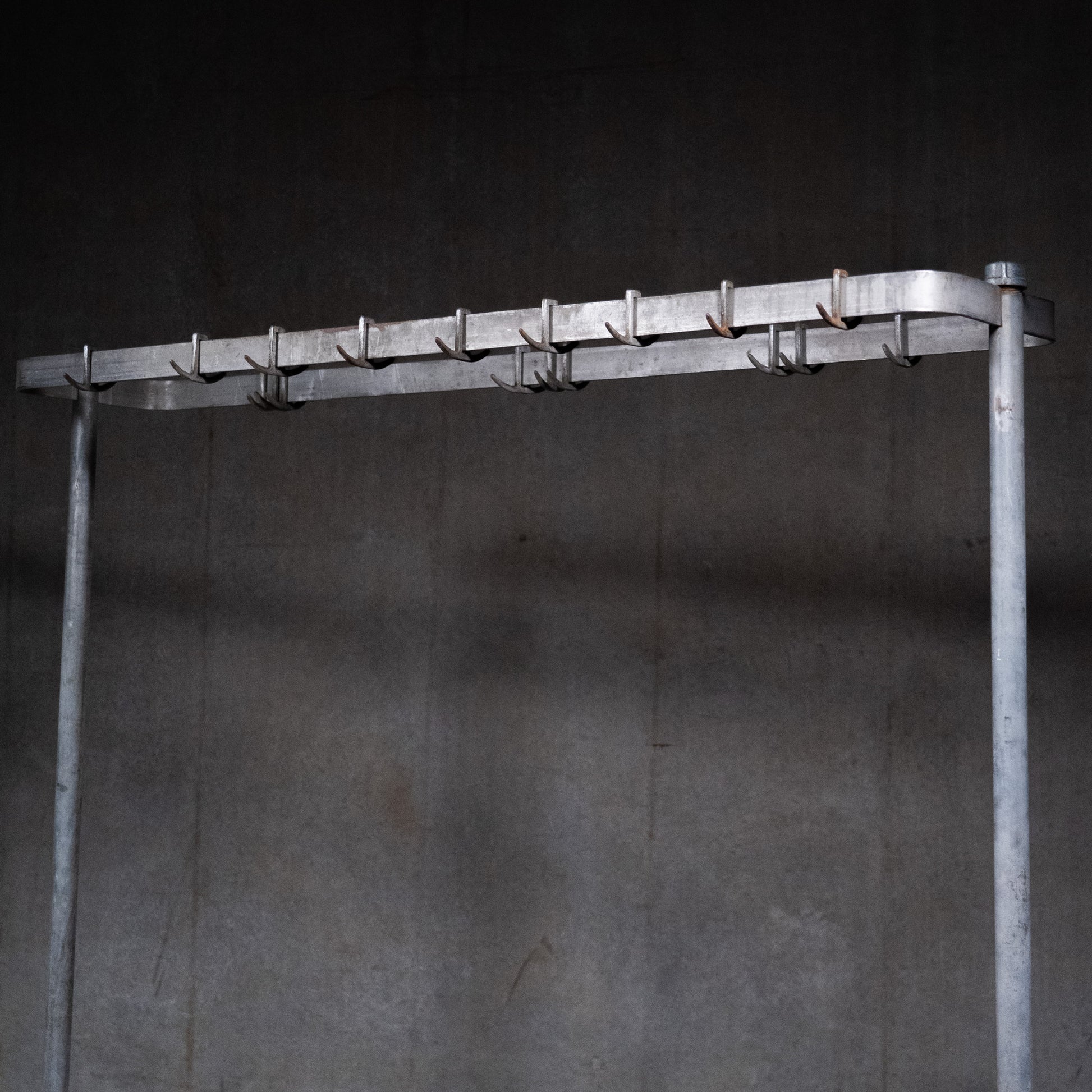 meat hook table | Scott Landon Antiques and Interiors.