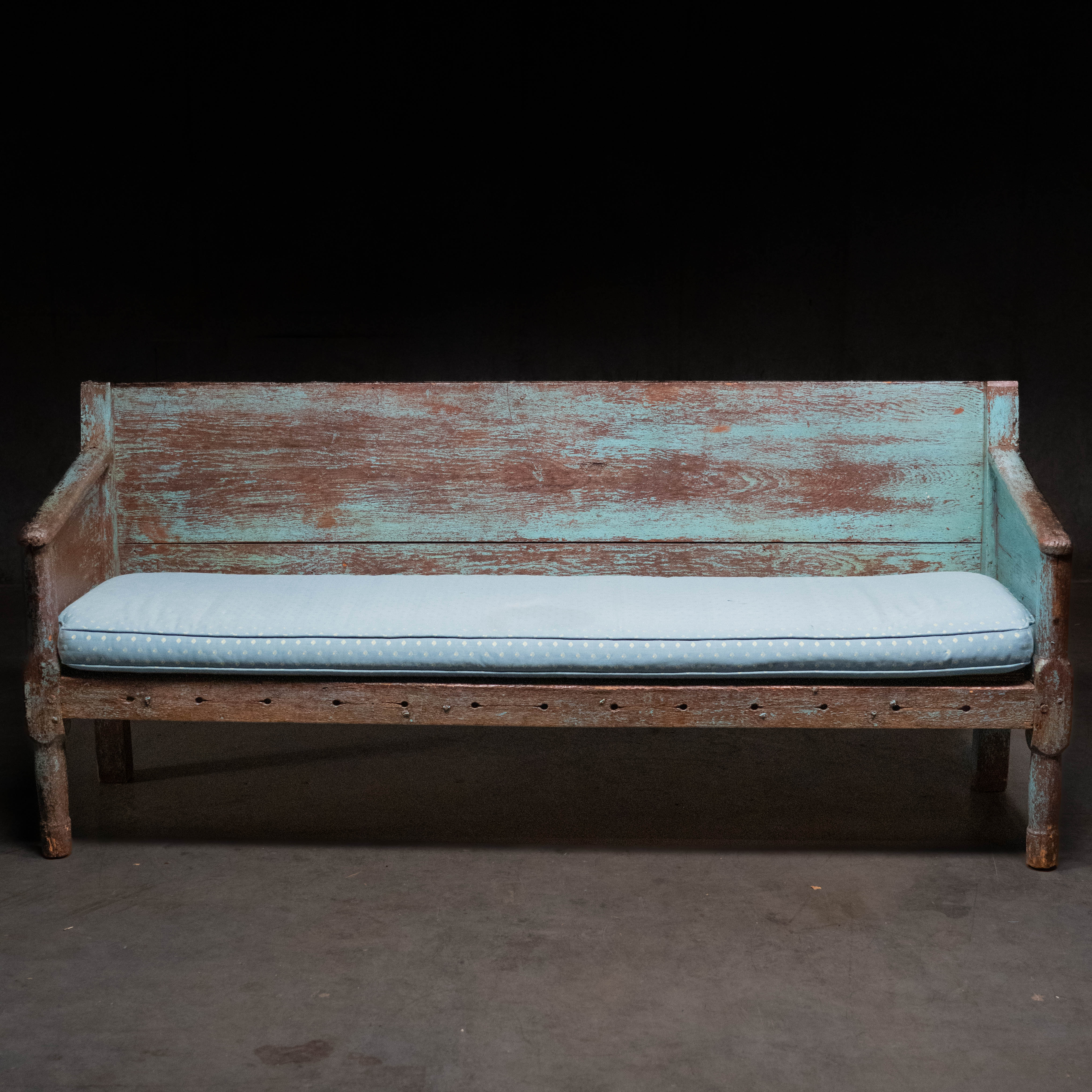 19th century Canadian East Coast primitive pine bench with original blue painted surface and custom cushion.