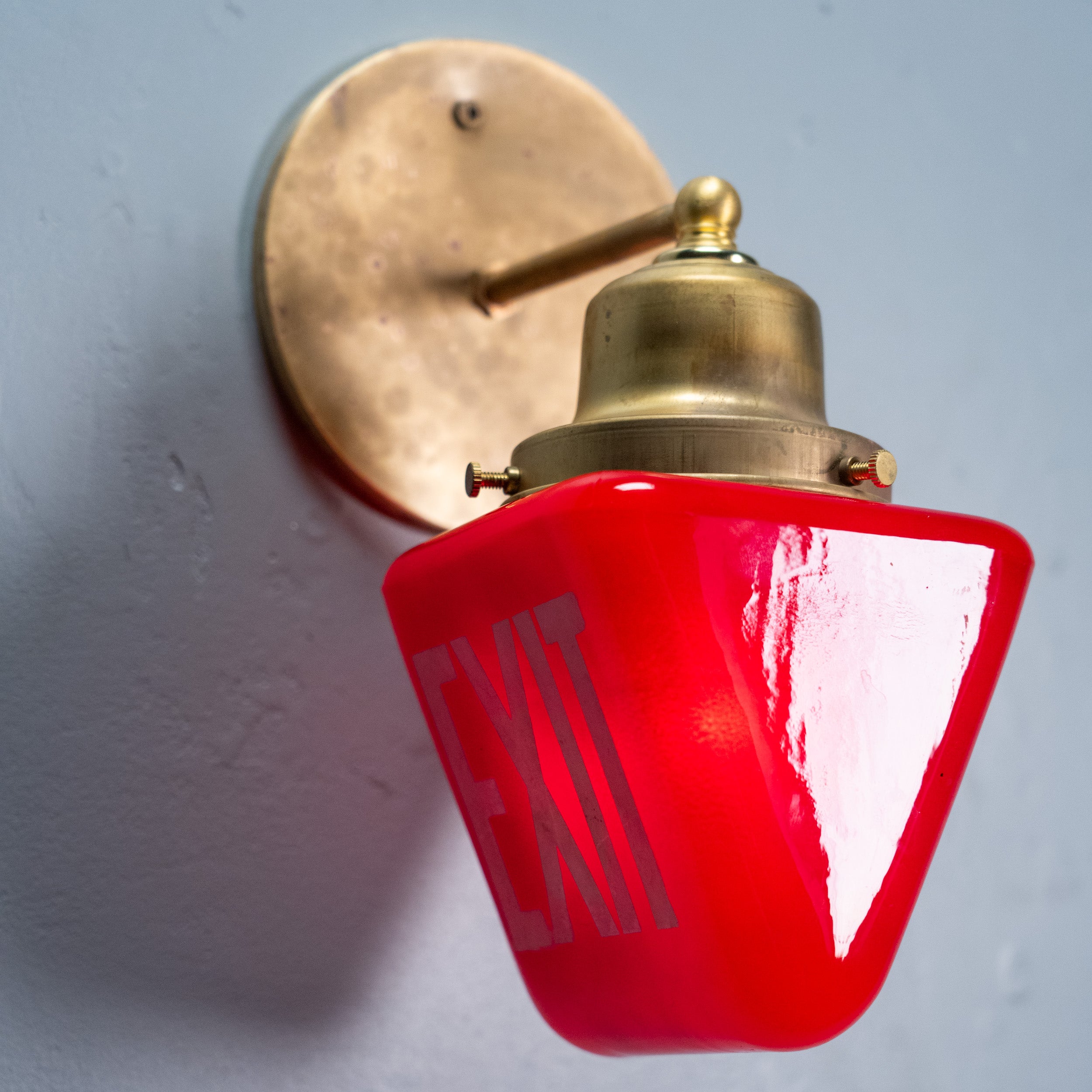 exit light sconce | Scott Landon Antiques and Interiors.