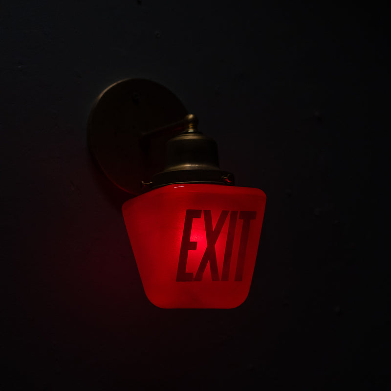 exit light sconce | Scott Landon Antiques and Interiors.