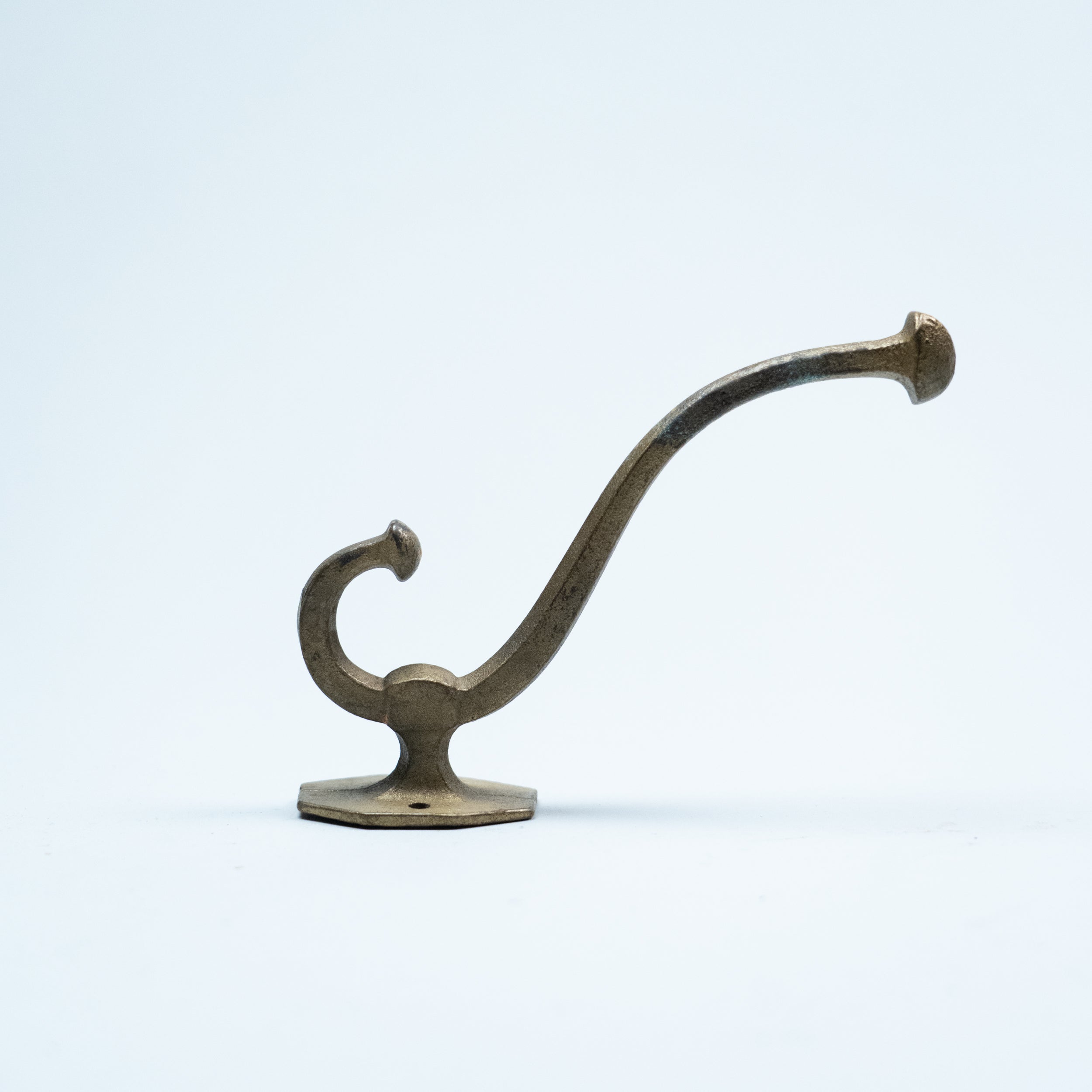 large brass hooks | Scott Landon Antiques and Interiors.