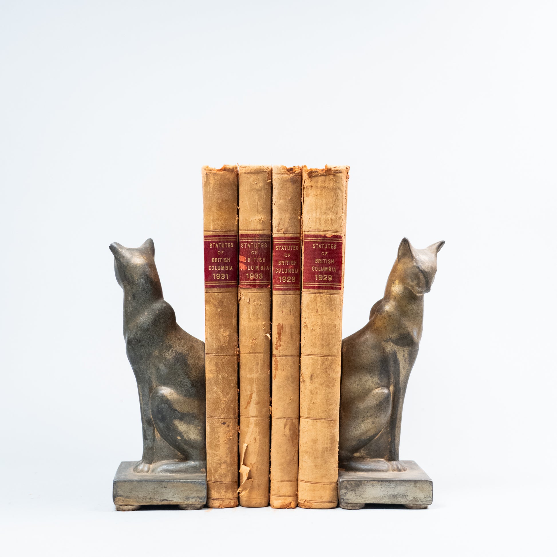 set of brass plated book ends | Scott Landon Antiques and Interiors.