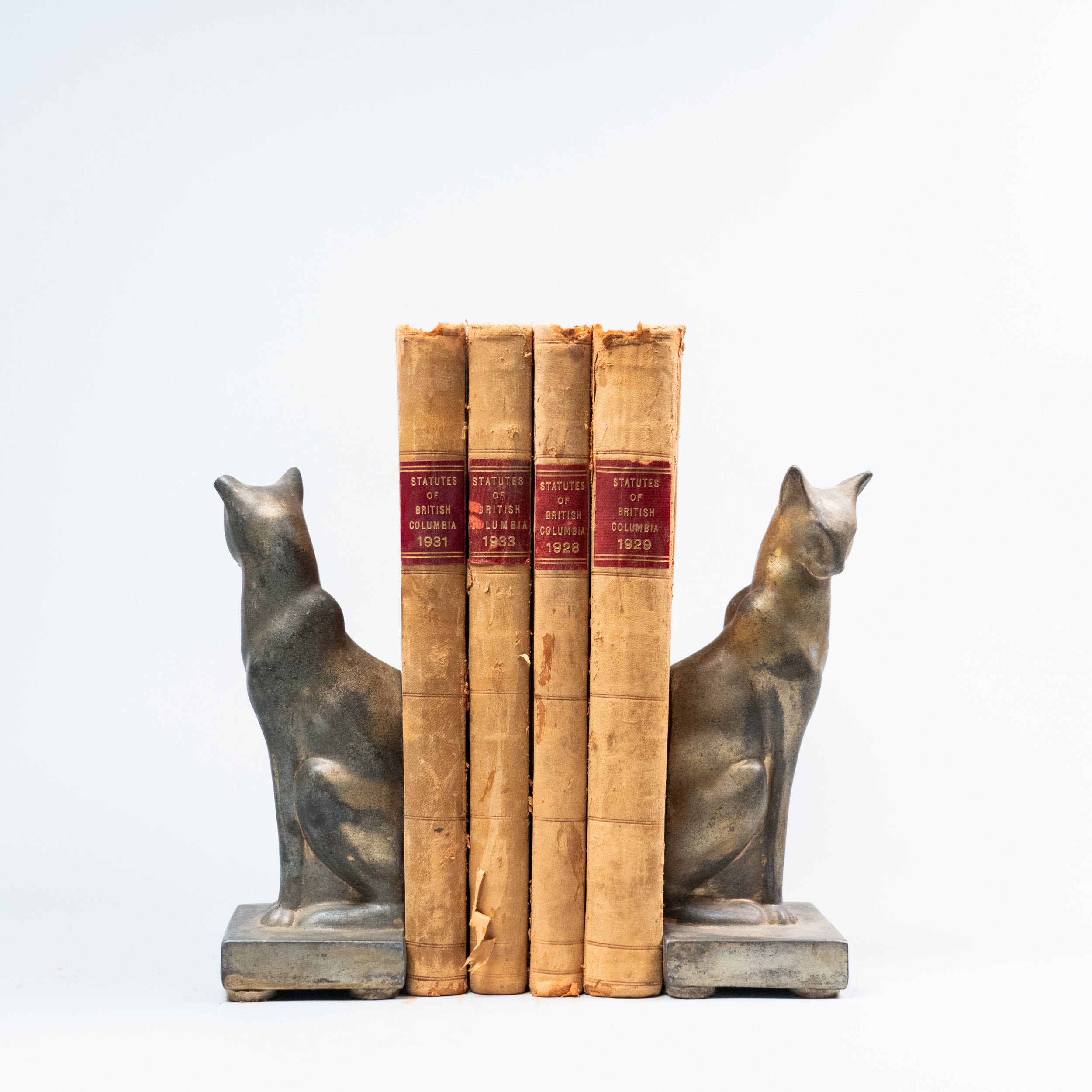 set of brass plated book ends | Scott Landon Antiques and Interiors.