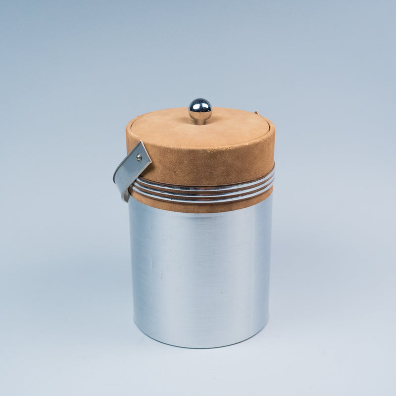 Vintage Georges Briard mid-century modern brushed aluminum ice bucket with tan suede lid and chrome accents. | Scott Landon Antiques and Interiors.