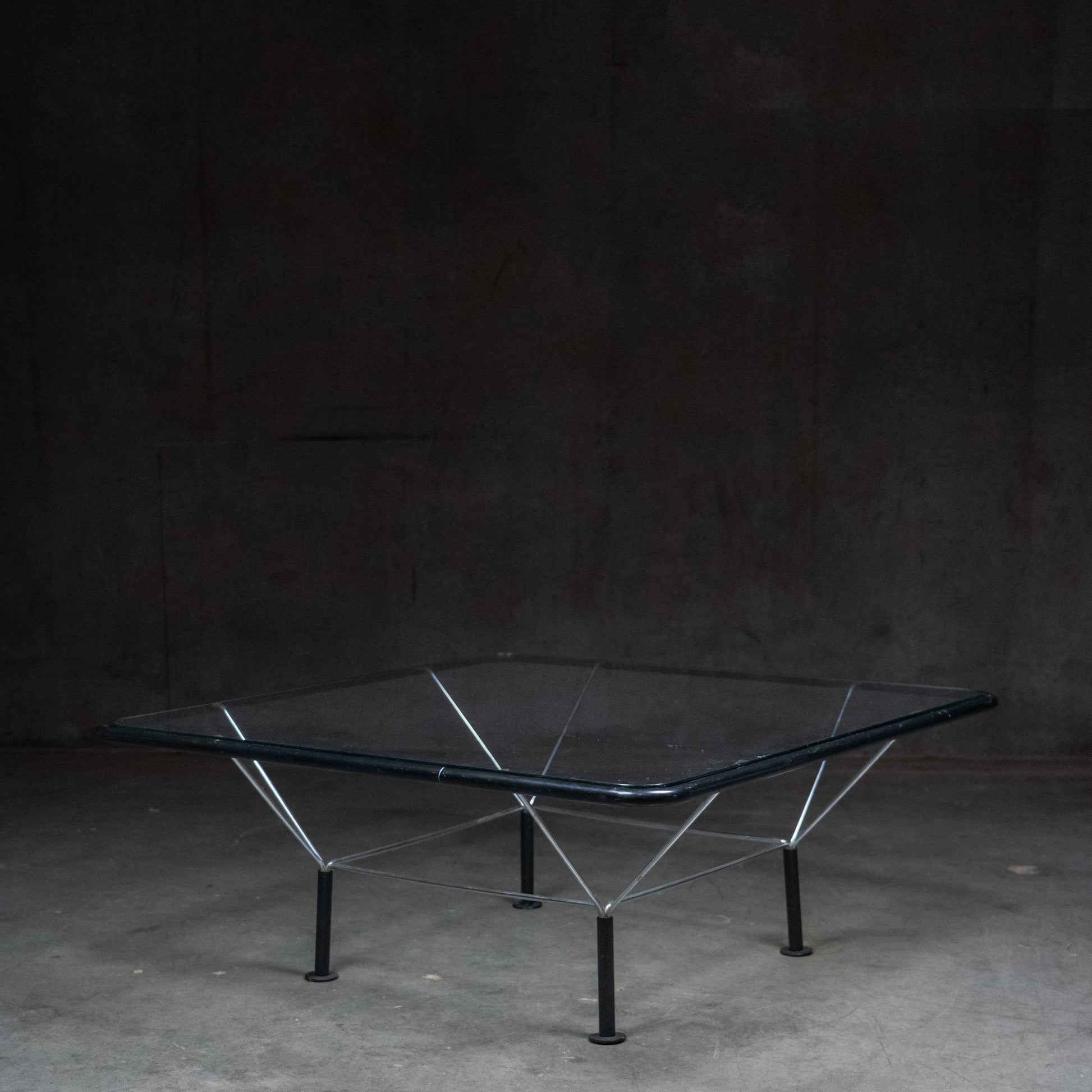 Niels Bendtsen Spaceframe coffee table for Bensen with tempered glass top and sculptural steel frame.