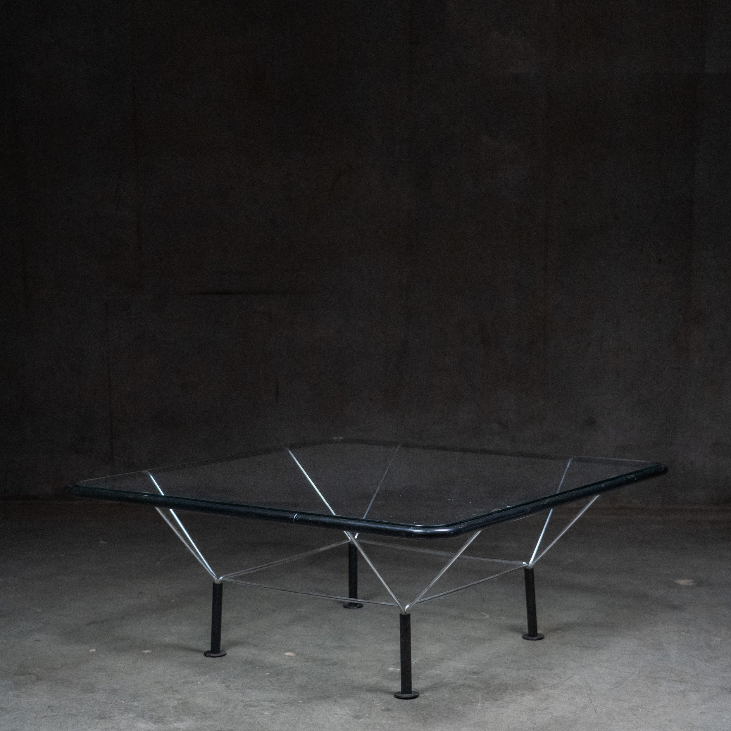 Niels Bendtsen Spaceframe coffee table for Bensen with tempered glass top and sculptural steel frame.