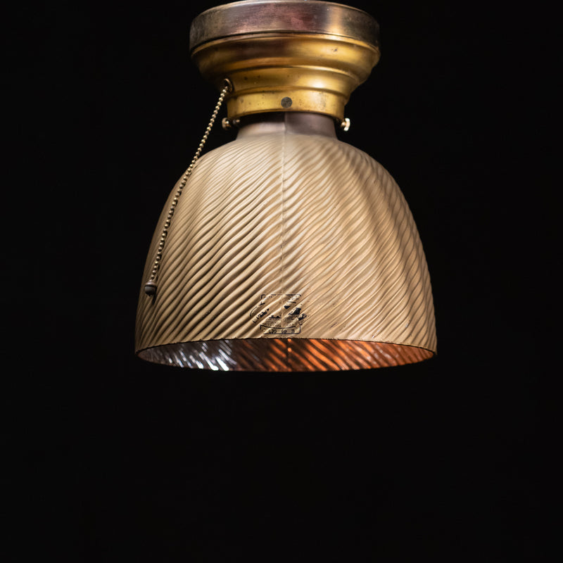 Antique mercury glass flush mount ceiling light with ribbed reflector shade and original brass canopy.