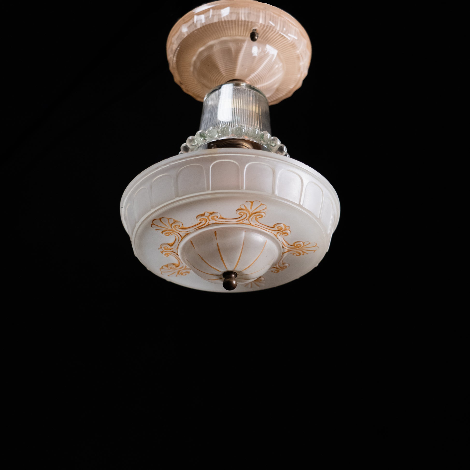 Antique Art Deco custard glass flush mount ceiling light with gold decoration and clear prismatic glass gallery. | Scott Landon Antiques and Interiors.