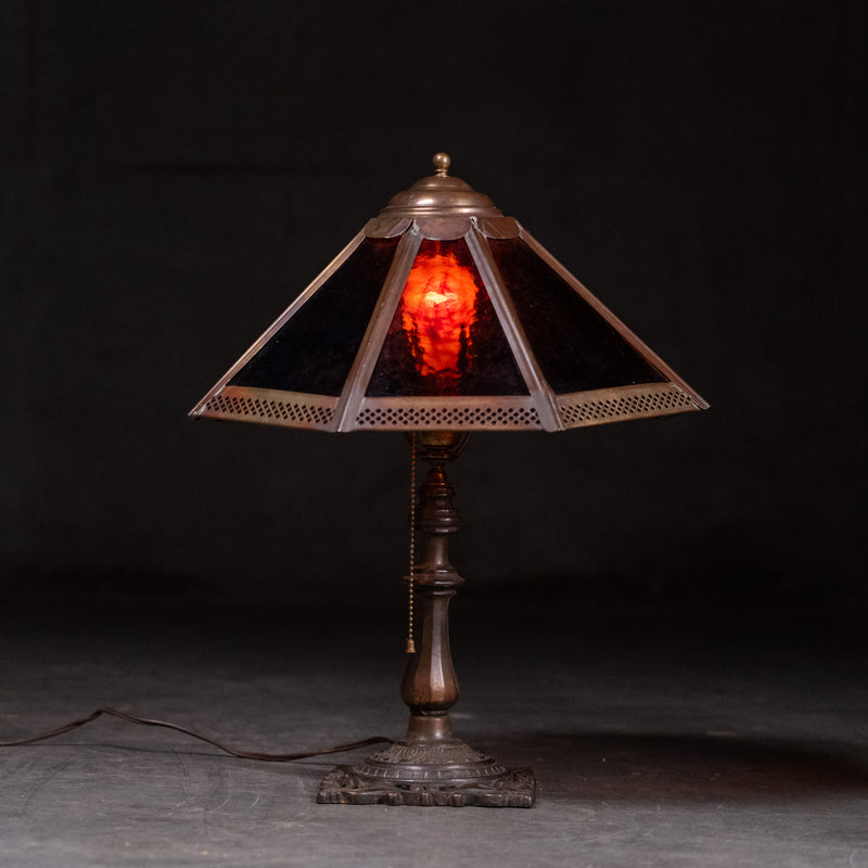 Antique Arts and Crafts table lamp with red slag glass shade and cast metal base circa 1910 | Scott Landon Antiques and Interiors.