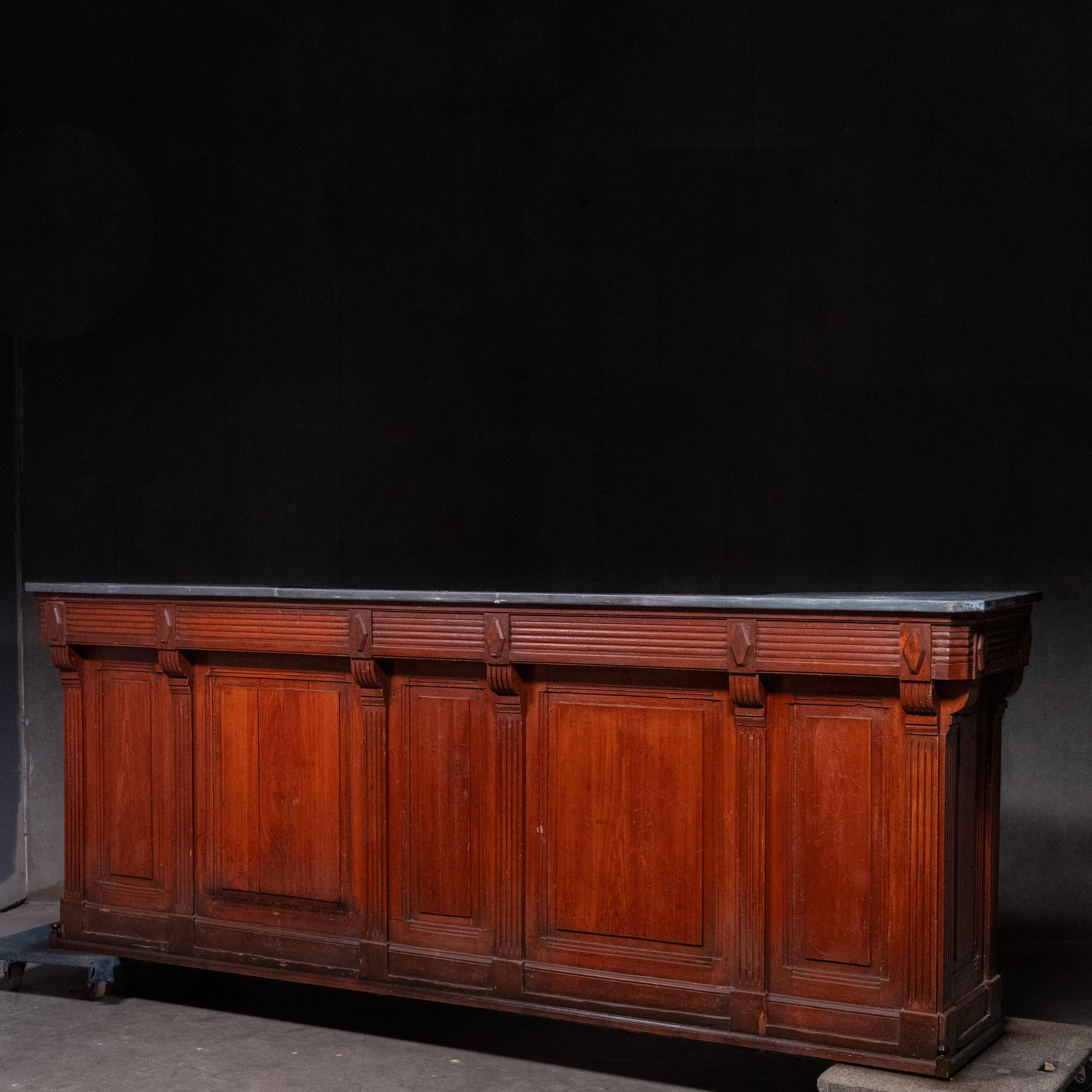 Antique French bar counter with original zinc top, integrated sink, paneled hardwood façade and commercial café styling, circa 1900