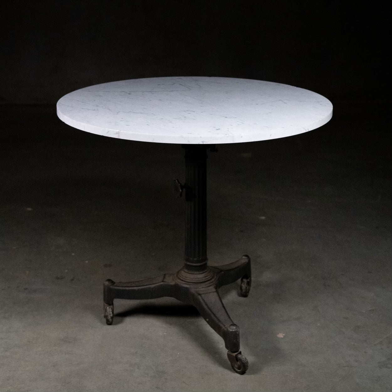 1930 marble top adjustable round bistro style table