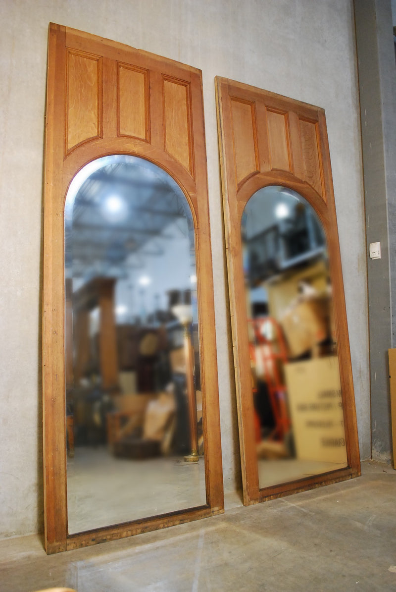 1900 Solid oak panels with arched beveled mirror | Scott Landon Antiques and Interiors.