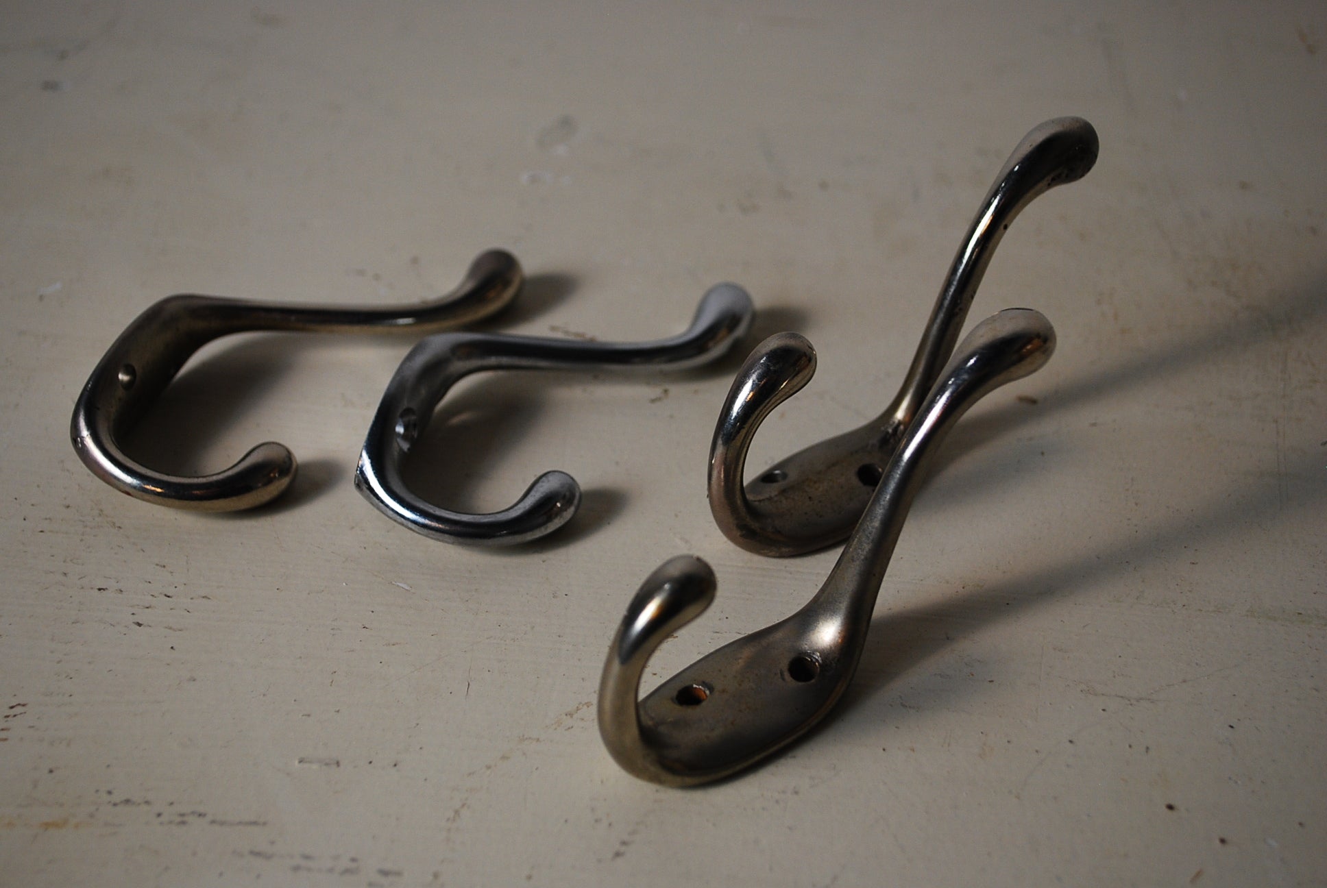 1940 solid chrome Hooks | Scott Landon Antiques and Interiors.