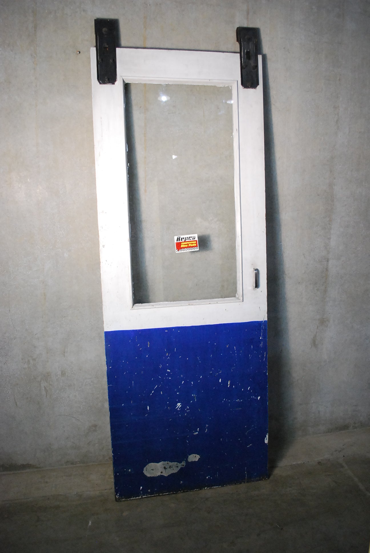 1940 Chevron station sliding door | Scott Landon Antiques and Interiors.