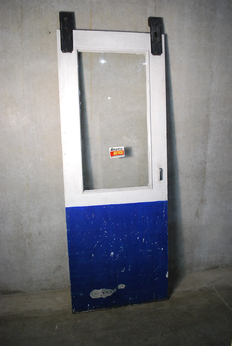 1940 Chevron station sliding door | Scott Landon Antiques and Interiors.