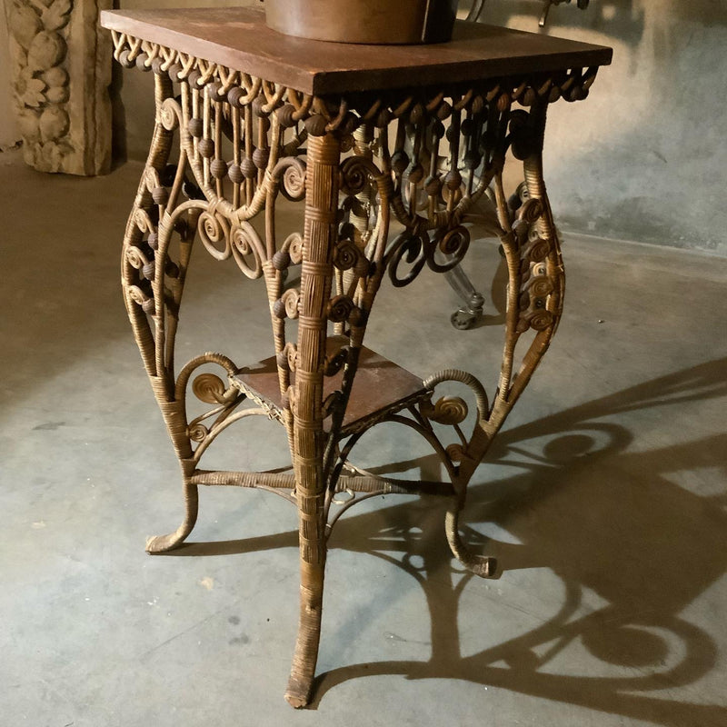 1890 American Victorian wicker table by heywood wakefield | Scott Landon Antiques and Interiors.