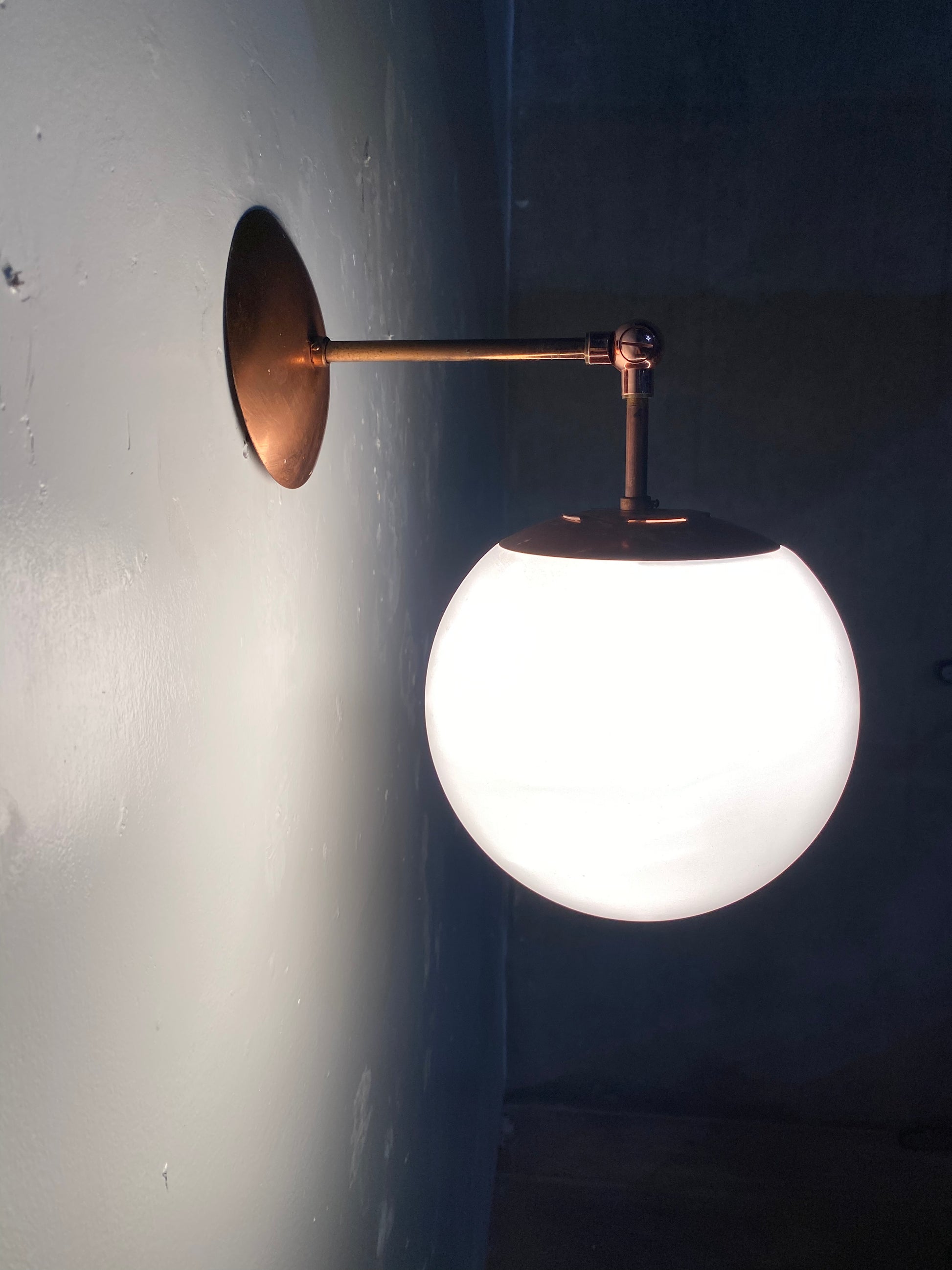 1960 mcm copper articulating sconce light | Scott Landon Antiques and Interiors.