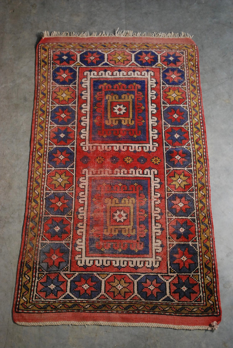 Vintage Persian wool hand made rug | Scott Landon Antiques and Interiors.